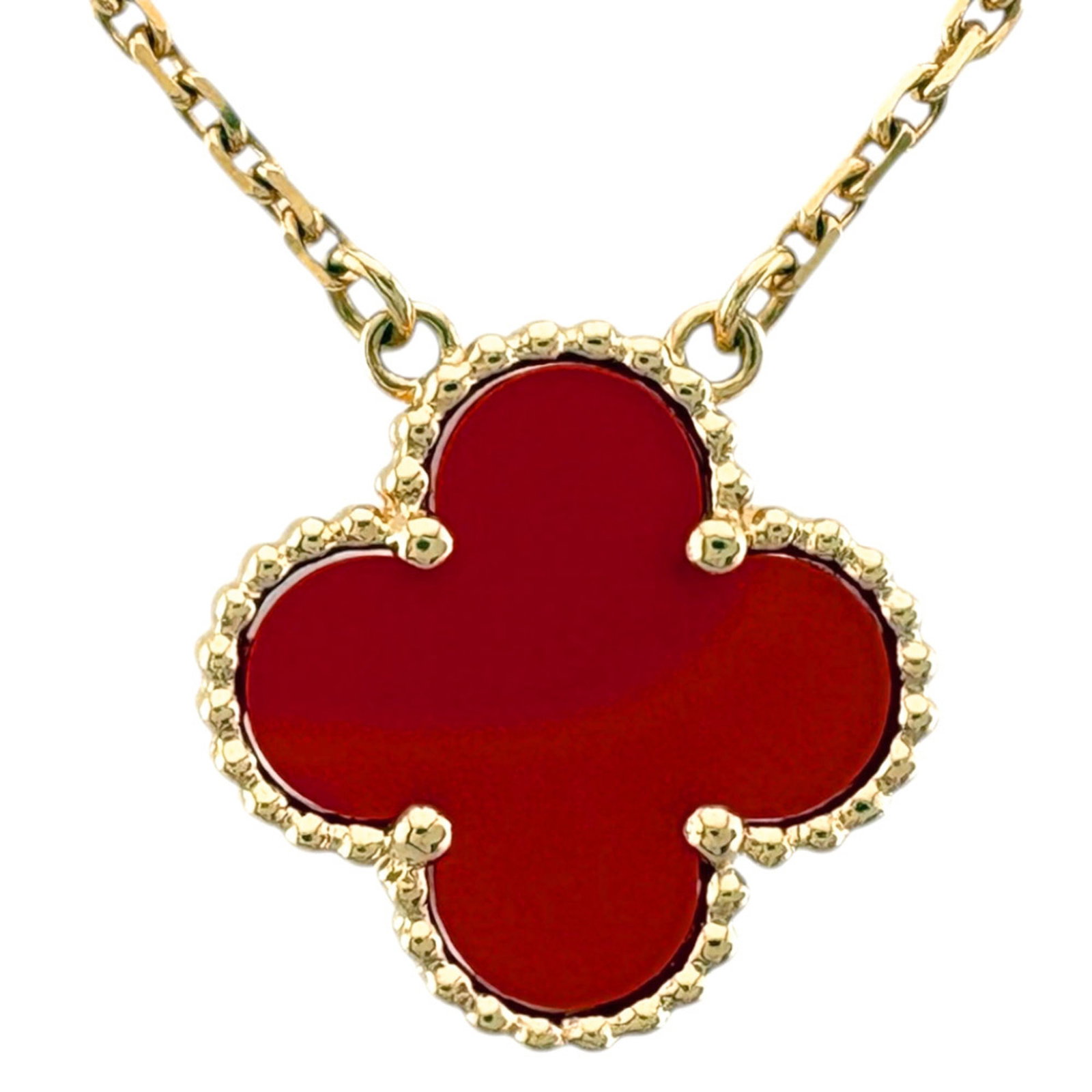Carnelian Alhambra Necklace 18K Gold For Women Van Cleef Arpels: Carnelian Alhambra Necklace 18K Gold For Women Van Cleef Arpels 18K yellow gold Carnelian Alhambra Necklace from Van Cleef & Arpels, featuring a beautiful 14.5mm x 14.5mm carnelian pendant suspended f