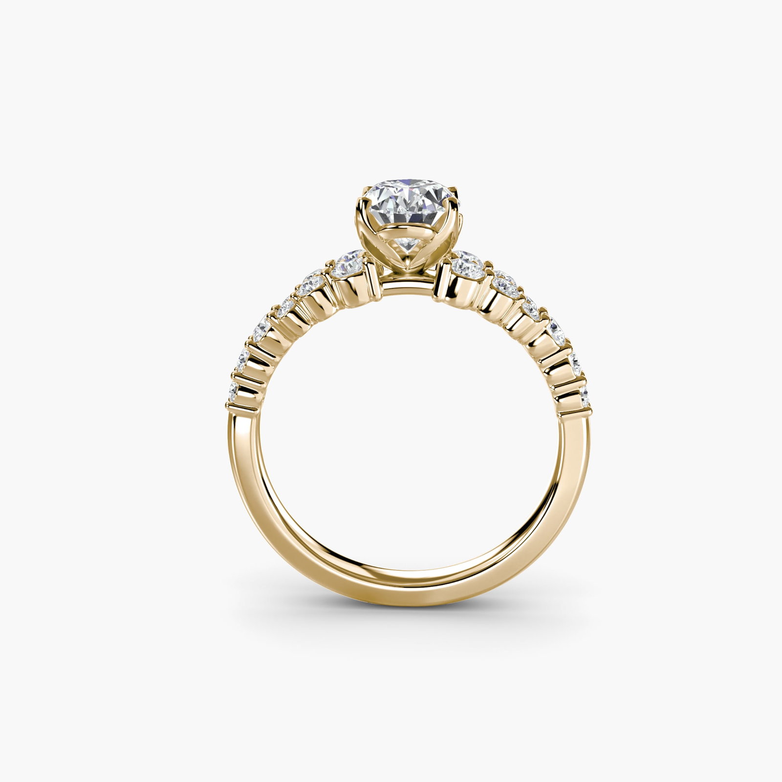 Side Stone Oval 14Kt Yellow Gold Ring Setting: Side Stone Oval 14Kt Yellow Gold Ring Setting Oval ring setting in 14Kt yellow gold, featuring 24 side stones totaling 0.485 carats, set within a band measuring 2.3mm in width. The metal weight is 3.0