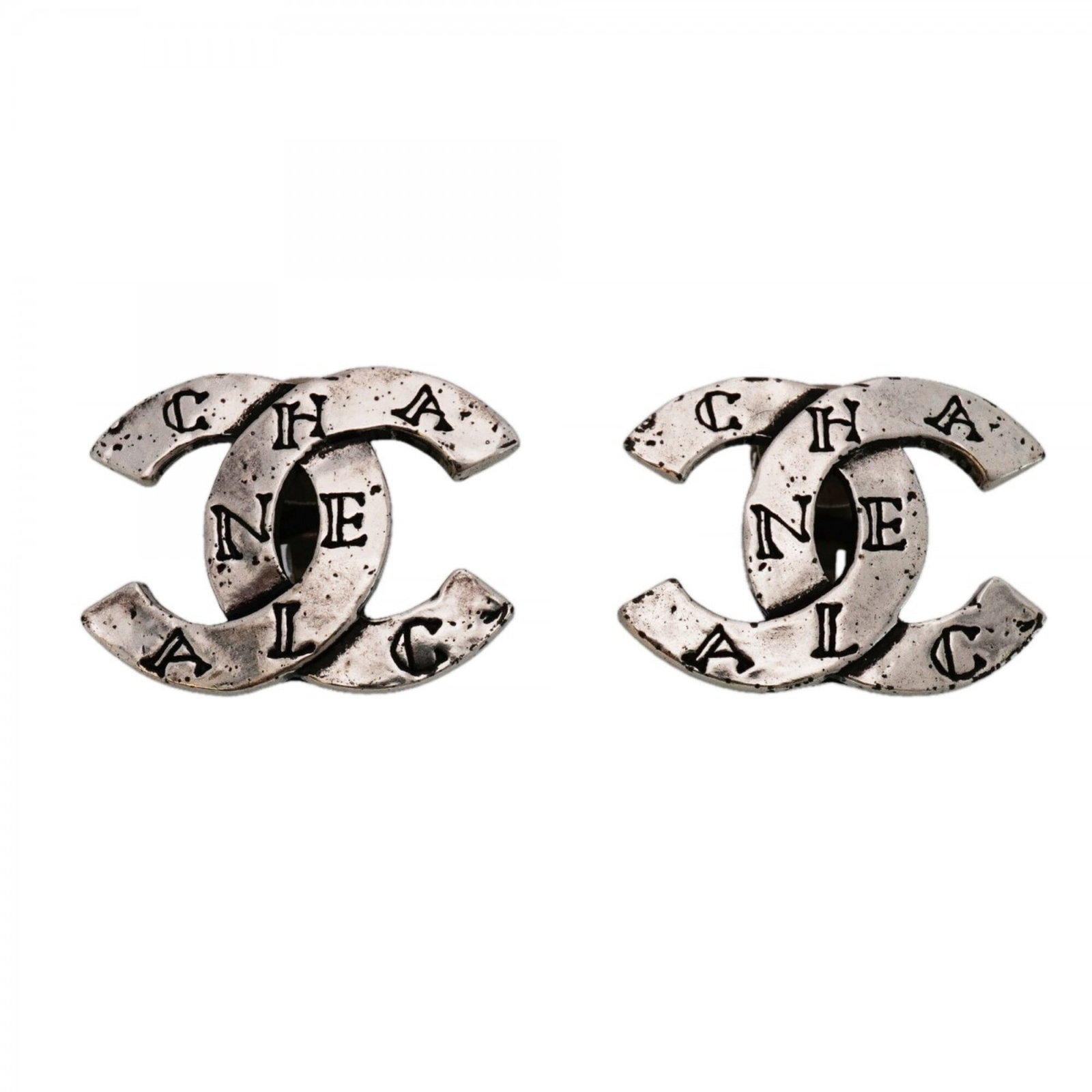 Clip earrings metal by Chanel: Clip earrings metal by Chanel Clip earrings in silver metal, designed by the iconic French fashion house Chanel. With their sleek and modern design, these earrings feature a durable clip-on style