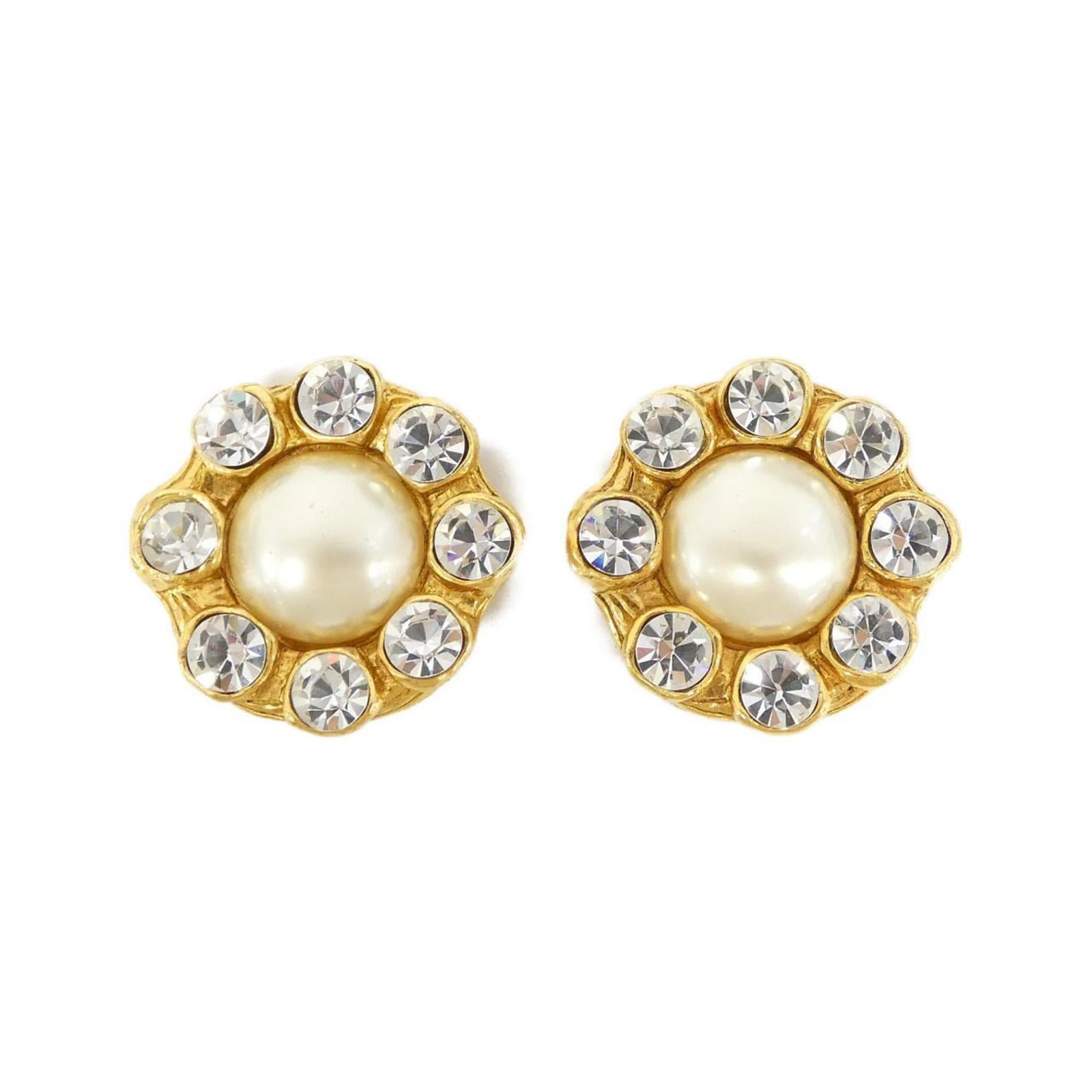 Chanel Clip Earrings: Chanel Clip Earrings Chanel Clip Earrings in Gold and Crystal, featuring a classic design with a subtle sparkle. Made from high-quality materials, these earrings showcase a few traces of usage,