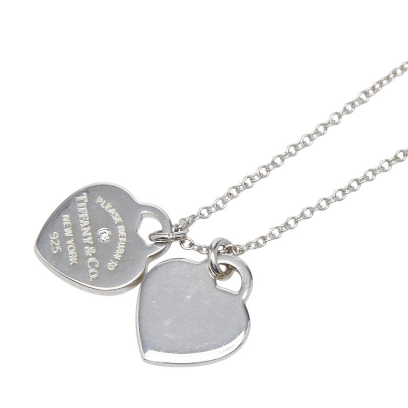 Return to Tiffany Double Heart Tag with 1 Diamond Necklace in 925 Sterling Silver for Women.: Return to Tiffany Double Heart Tag with 1 Diamond Necklace in 925 Sterling Silver for Women. Double heart charm adorns the elegant 925 sterling silver necklace, complemented by a single diamond pendan