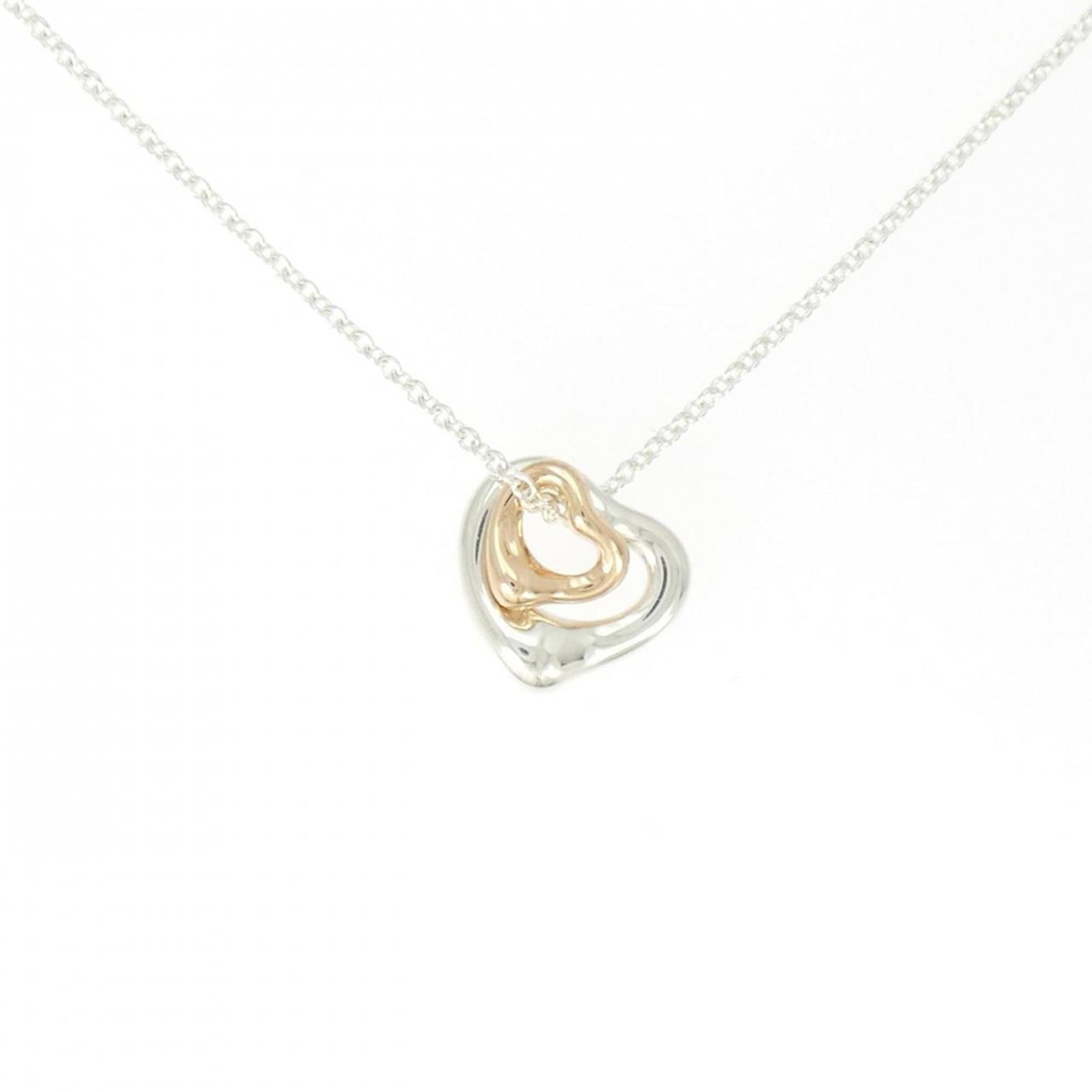Mini Open Heart Necklace Extra Tiffany: Mini Open Heart Necklace Extra Tiffany Pink Gold (18K) and Silver 925 combine in the Mini Open Heart Necklace Extra Tiffany, a delicate yet elegant pendant. With its 41 cm / 16.14'' adjustable neck ci