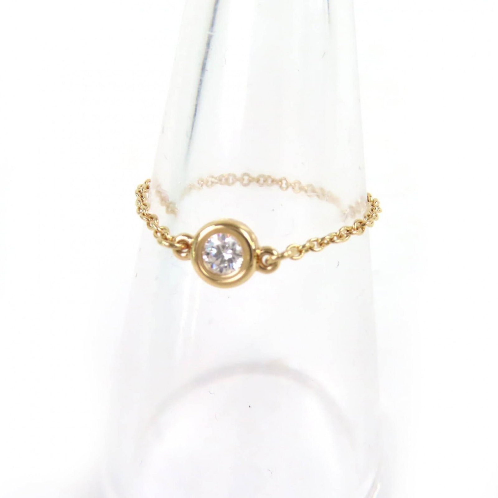 Tiffany Ring Gold Yellow 18K: Tiffany Ring Gold Yellow 18K 18K Yellow Gold Tiffany Band Ring with Diamond features a classic design and elegant details. The ring boasts a beautiful diamond stone set in high-quality yellow gold, sh