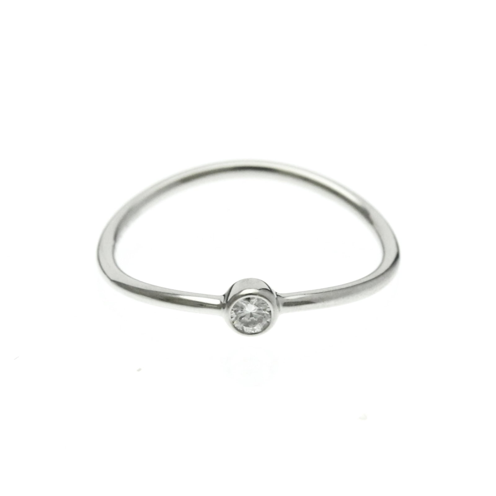 Tiffany Band Ring White Gold (18K): Tiffany Band Ring White Gold (18K) Tiffany Band Ring White Gold (18K) - A sophisticated and elegant band ring featuring 18K white gold, adorned with a diamond. This fashion-forward piece boasts a slee