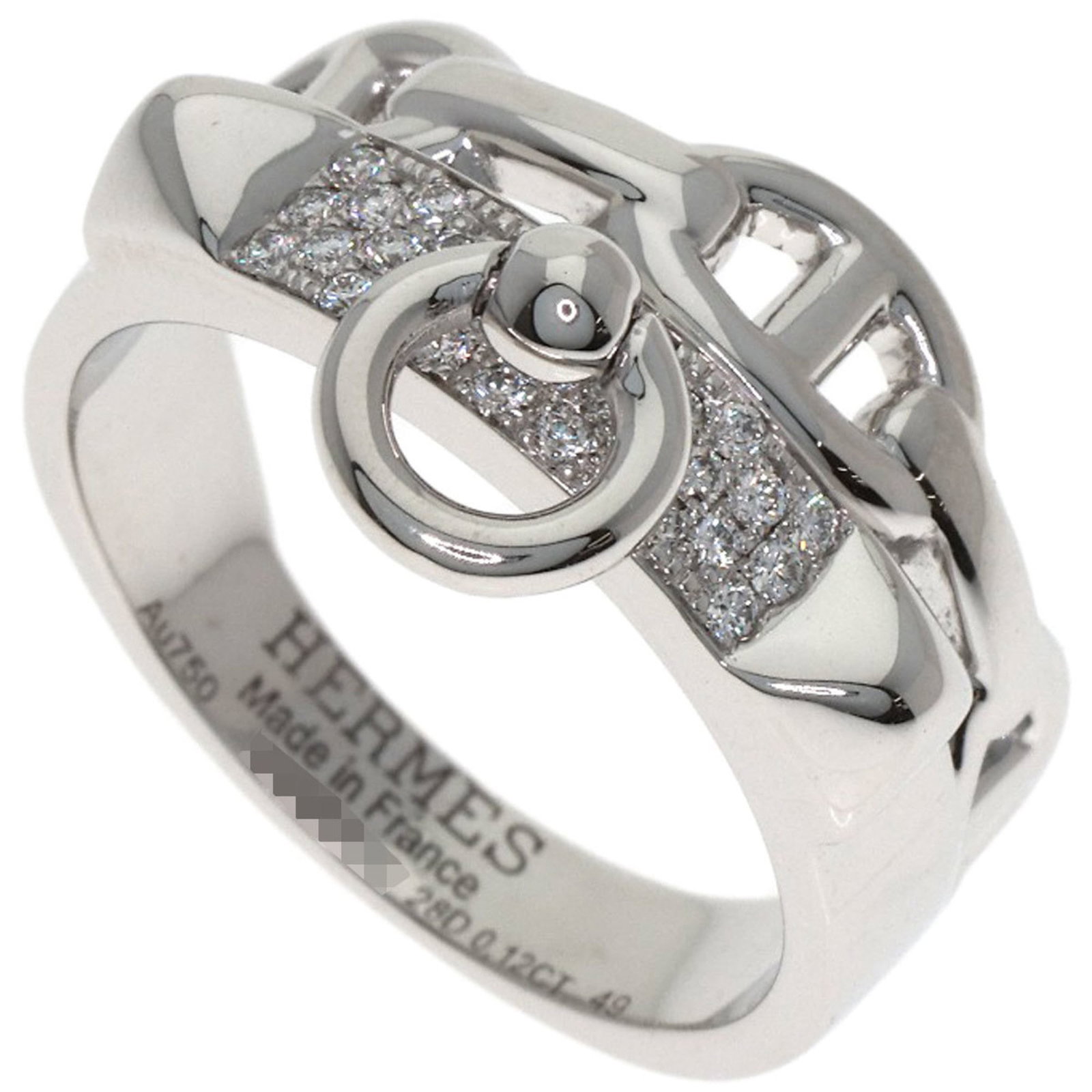 Hermes Band Ring White Gold (18K): Hermes Band Ring White Gold (18K) This 18K white gold band ring from Hermes features a diamond stone. The ring has been used and shows some signs of wear, with a few scratches and minor dirt marks, bu