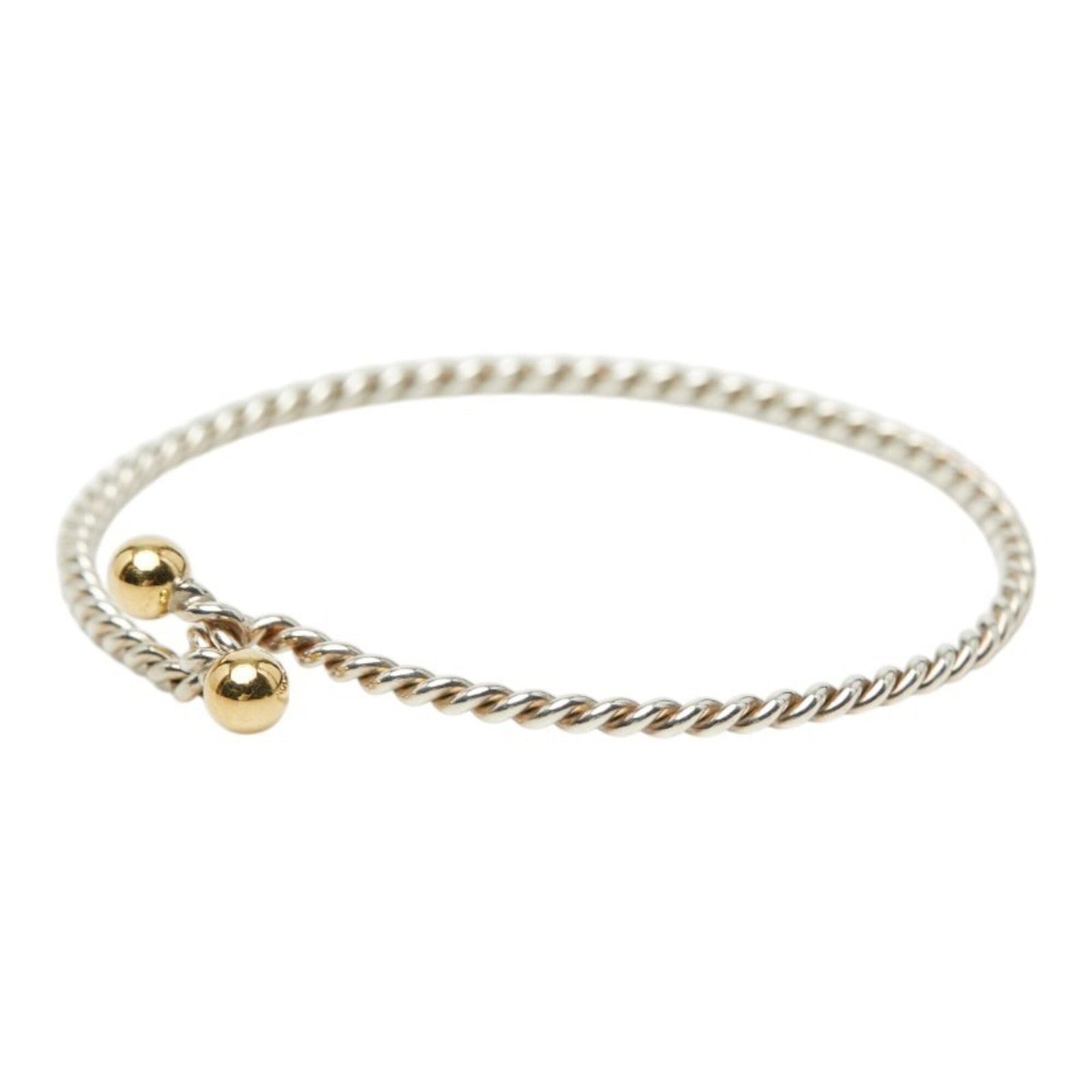 Tiffany Bangle Silver 925 Yellow Gold (18K): Tiffany Bangle Silver 925 Yellow Gold (18K) Silver and yellow gold bangle from Tiffany, crafted with 925 silver and 18K yellow gold. The bangle measures 16.5cm in length and shows signs of usage, incl