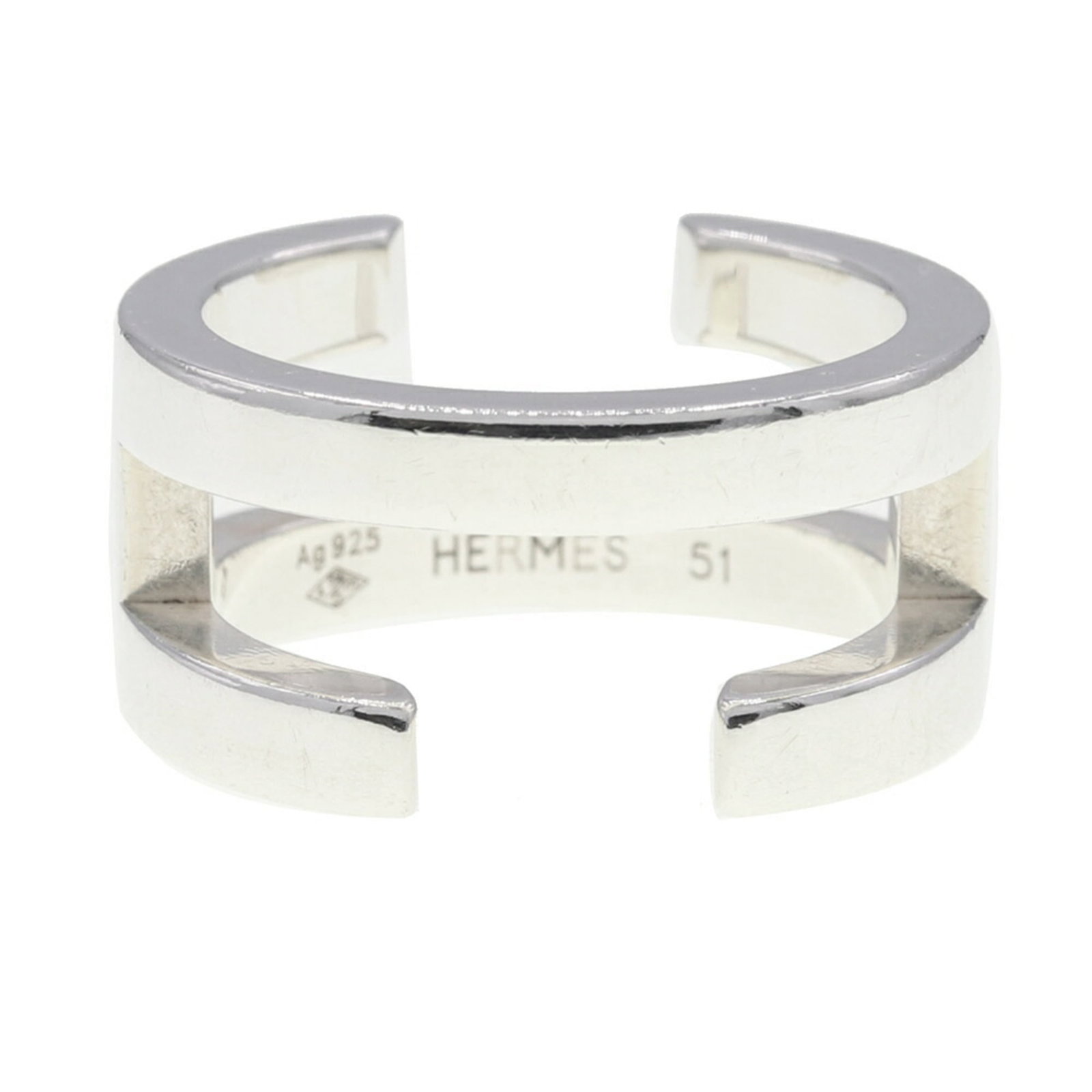 Sterling silver ring band Hermes: Sterling silver ring band Hermes Sterling silver ring band from Hermes, featuring a sleek design with a 10mm width and 0.39'' thickness, crafted from high-quality 925 sterling silver. This used band