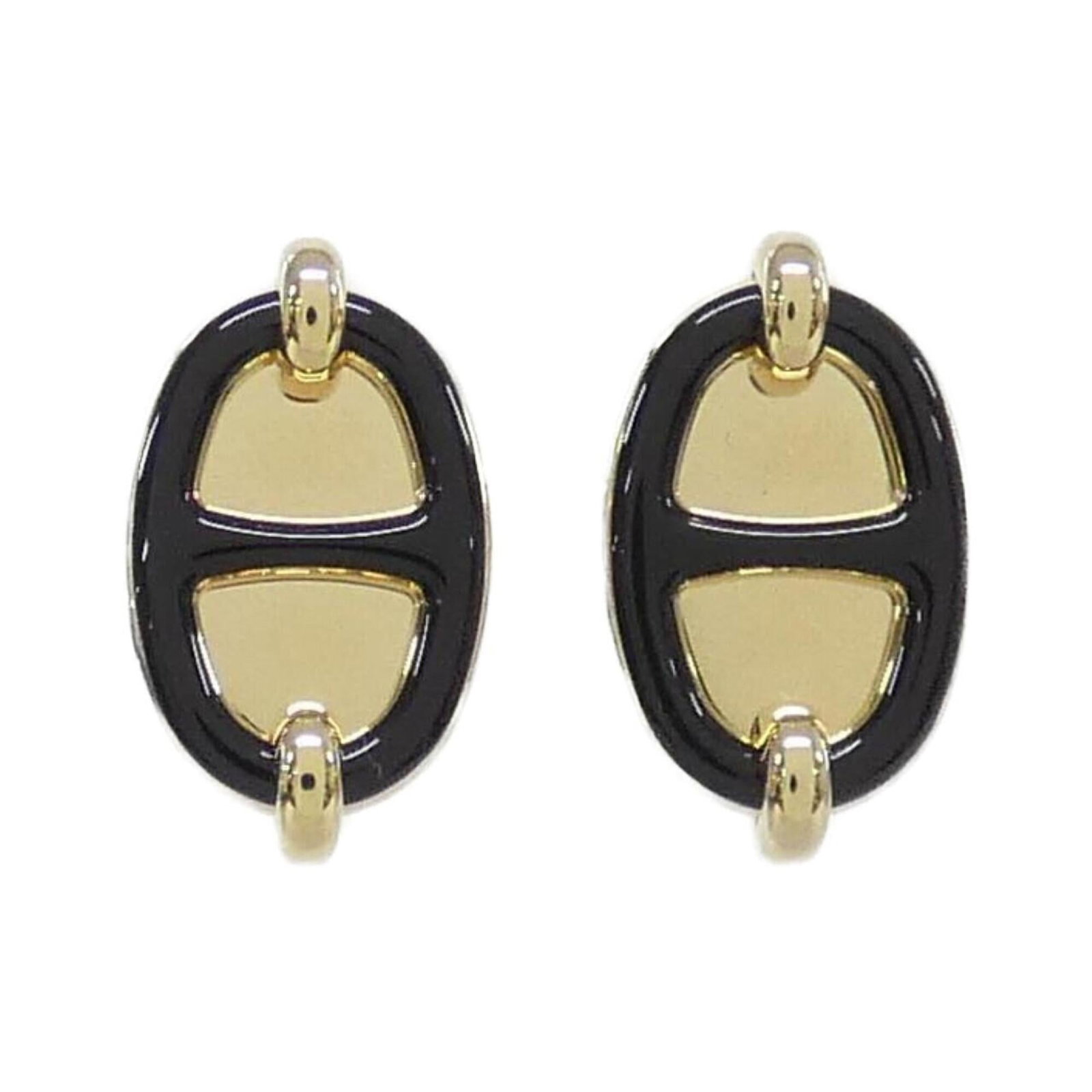 Hermes Clip Earrings: Hermes Clip Earrings Black Hermes Clip Earrings with a few traces of usage, some scratches / dirt visible. Made from high-quality materials, these earrings feature a sleek design that adds a touch of 