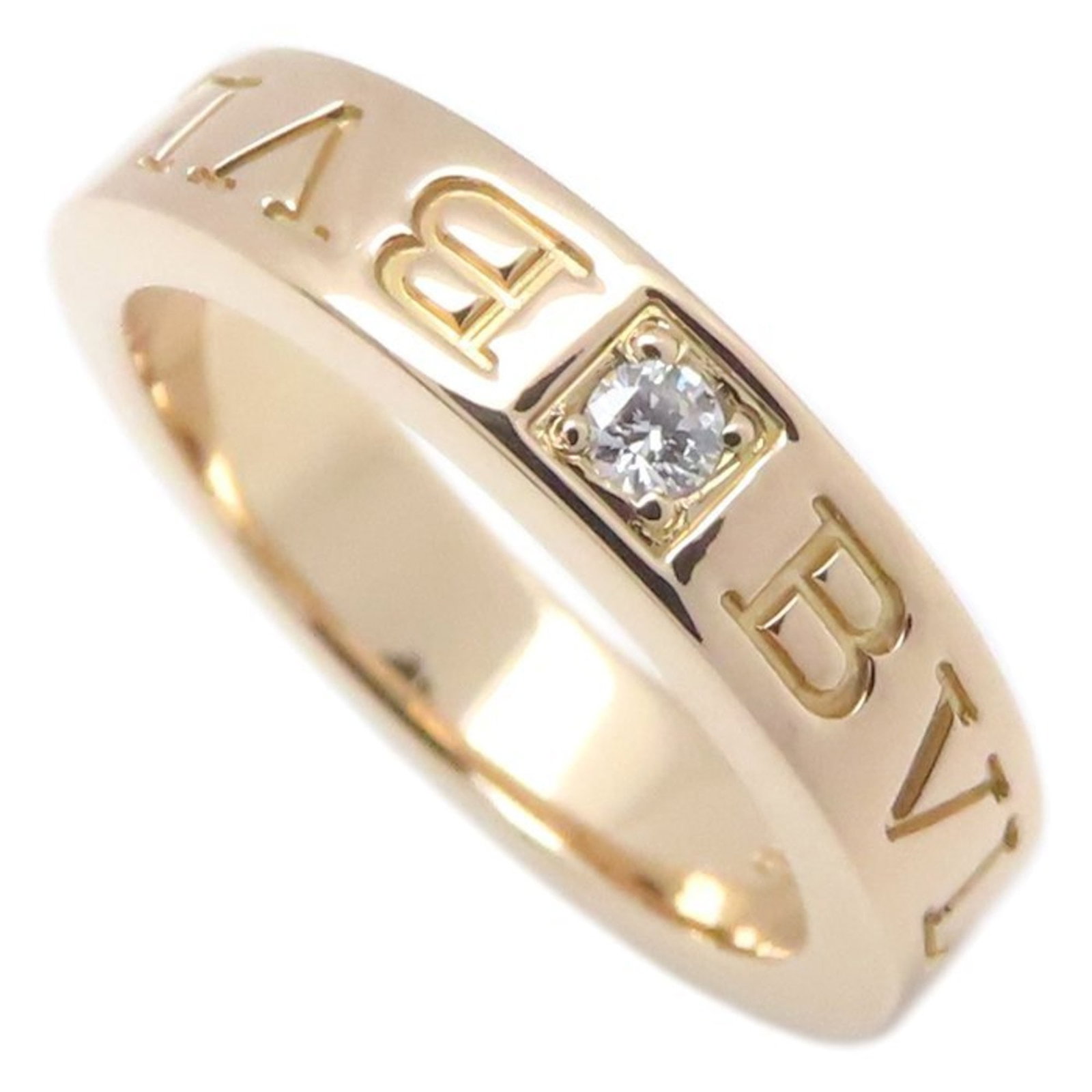 Pink Gold 18K Bvlgari Band Ring: Pink Gold 18K Bvlgari Band Ring Pink Gold 18K Bvlgari Band Ring. This stunning pink gold band ring features a diamond stone and boasts the iconic Bvlgari brand, making it a standout piece for anyone w