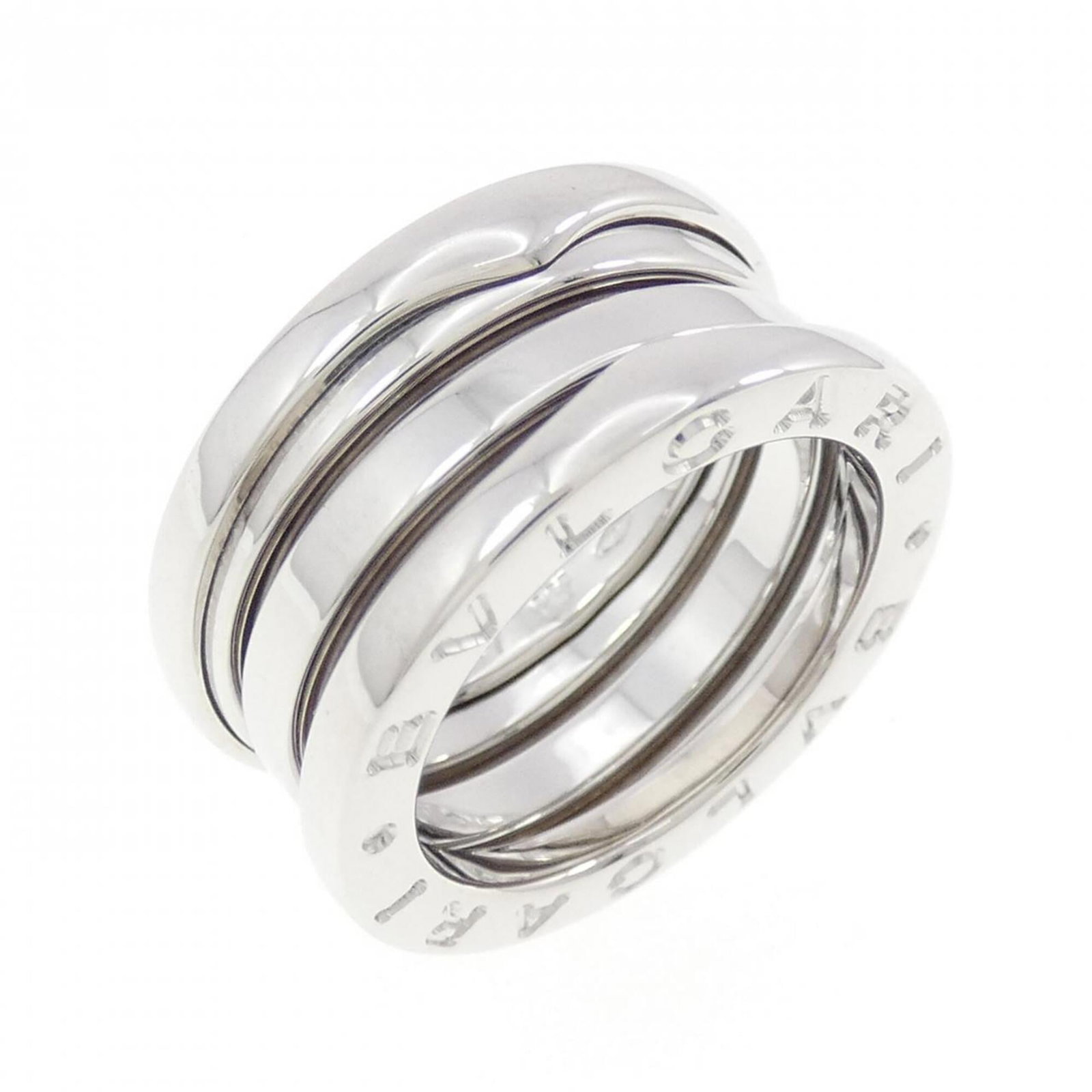 Bvlgari Band Ring White Gold (18K): Bvlgari Band Ring White Gold (18K) Bvlgari Band Ring White Gold (18K) - A sleek and sophisticated band ring crafted from high-quality white gold, featuring a classic design that exudes elegance. With 