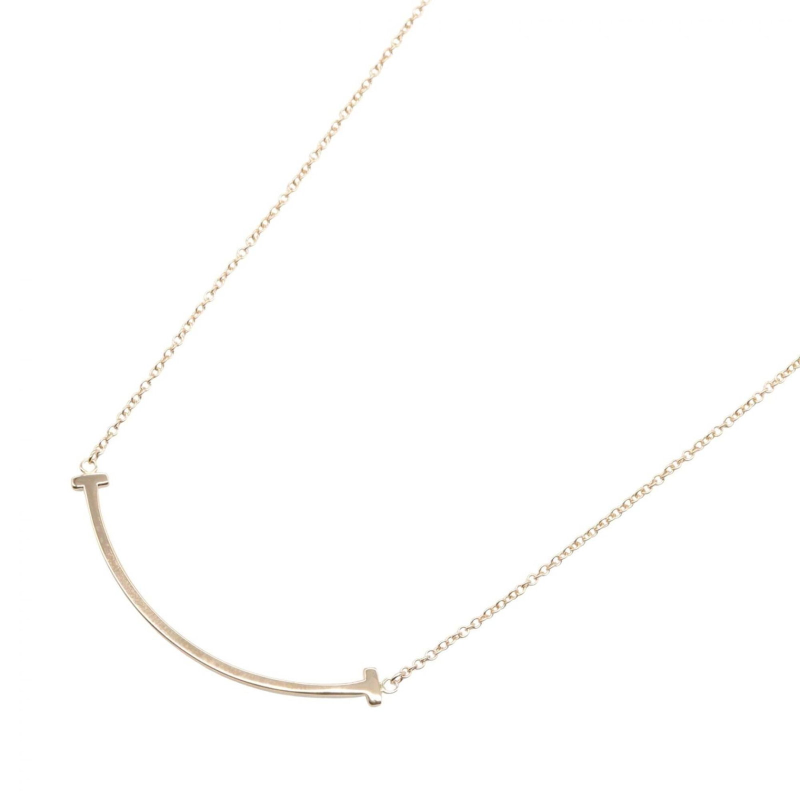 Tiffany & Co. T Smile Small Necklace 18K Pink Gold (Pg) Women'S Tone 60011679: Tiffany & Co. T Smile Small Necklace 18K Pink Gold (Pg) Women'S Tone 60011679 18K pink gold Tiffany & Co. T Smile Small Necklace, available in a versatile size to suit your style. This elegant