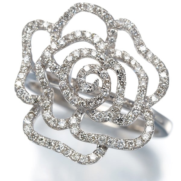 Diamond 0.54Ct Rose Flower Ring 18K 750 White Gold: Diamond 0.54Ct Rose Flower Ring 18K 750 White Gold 18k white gold sets the stage for this stunning diamond rose flower ring, featuring a 0.54ct main stone. The delicate flower design showcases the