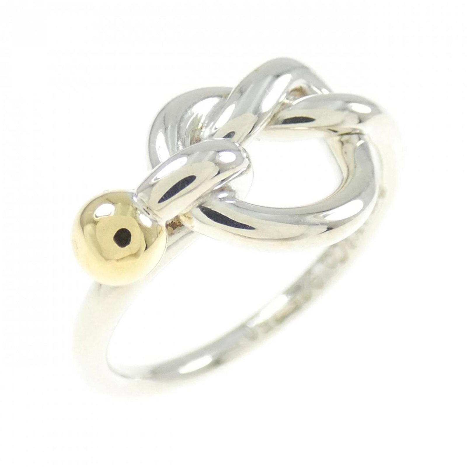 Tiffany Band Ring Silver 925 Yellow Gold (18K): Tiffany Band Ring Silver 925 Yellow Gold (18K) Silver 925 and 18K Yellow Gold band ring from Tiffany, featuring a classic design. This used item shows traces of usage with minor damages and dirt, but 