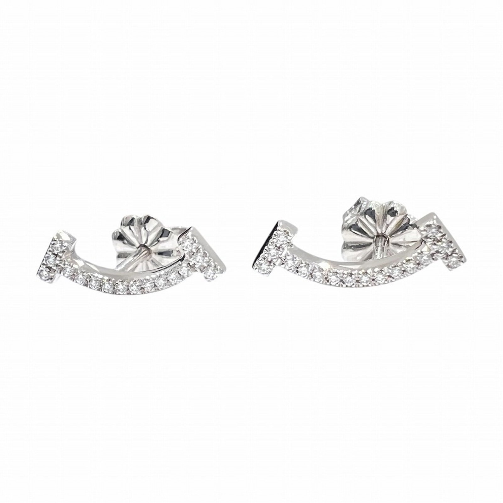 White Gold 18K Tiffany Stud Earrings: White Gold 18K Tiffany Stud Earrings White Gold 18K Tiffany Stud Earrings are crafted from high-quality white gold, with a classic stud design that exudes timeless elegance. The earrings feature a sub