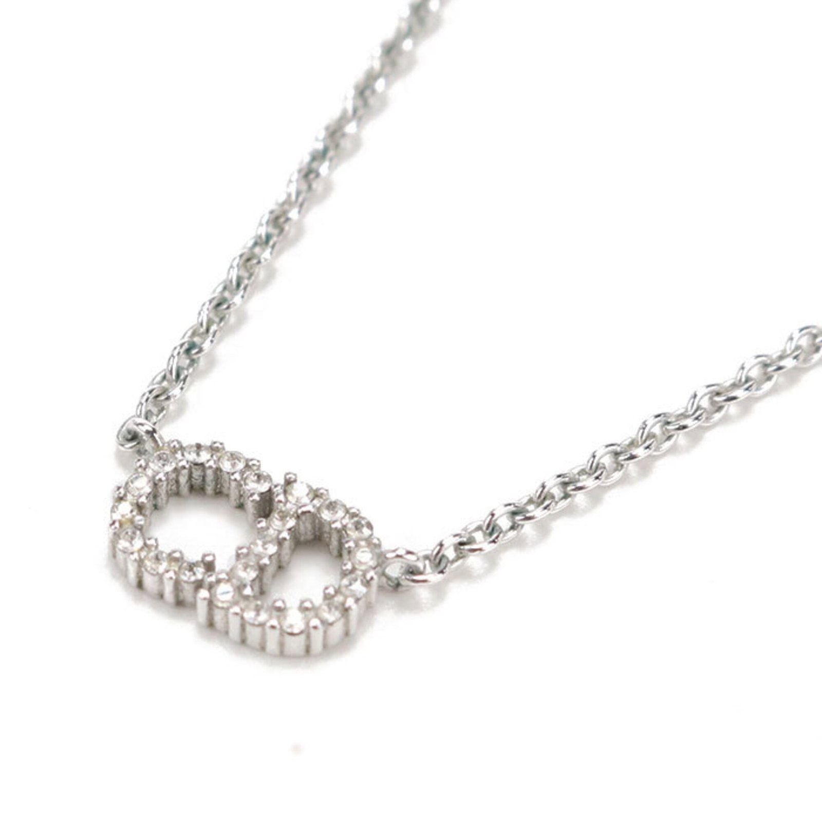Christian Dior Necklace N3523Womzi_D009 Claire D Lune Women'S Silver: Christian Dior Necklace N3523Womzi_D009 Claire D Lune Women'S Silver Silver pendant with a subtle Claire D Lune design, suspended from a delicate chain. The necklace features a mix of metal and minor 