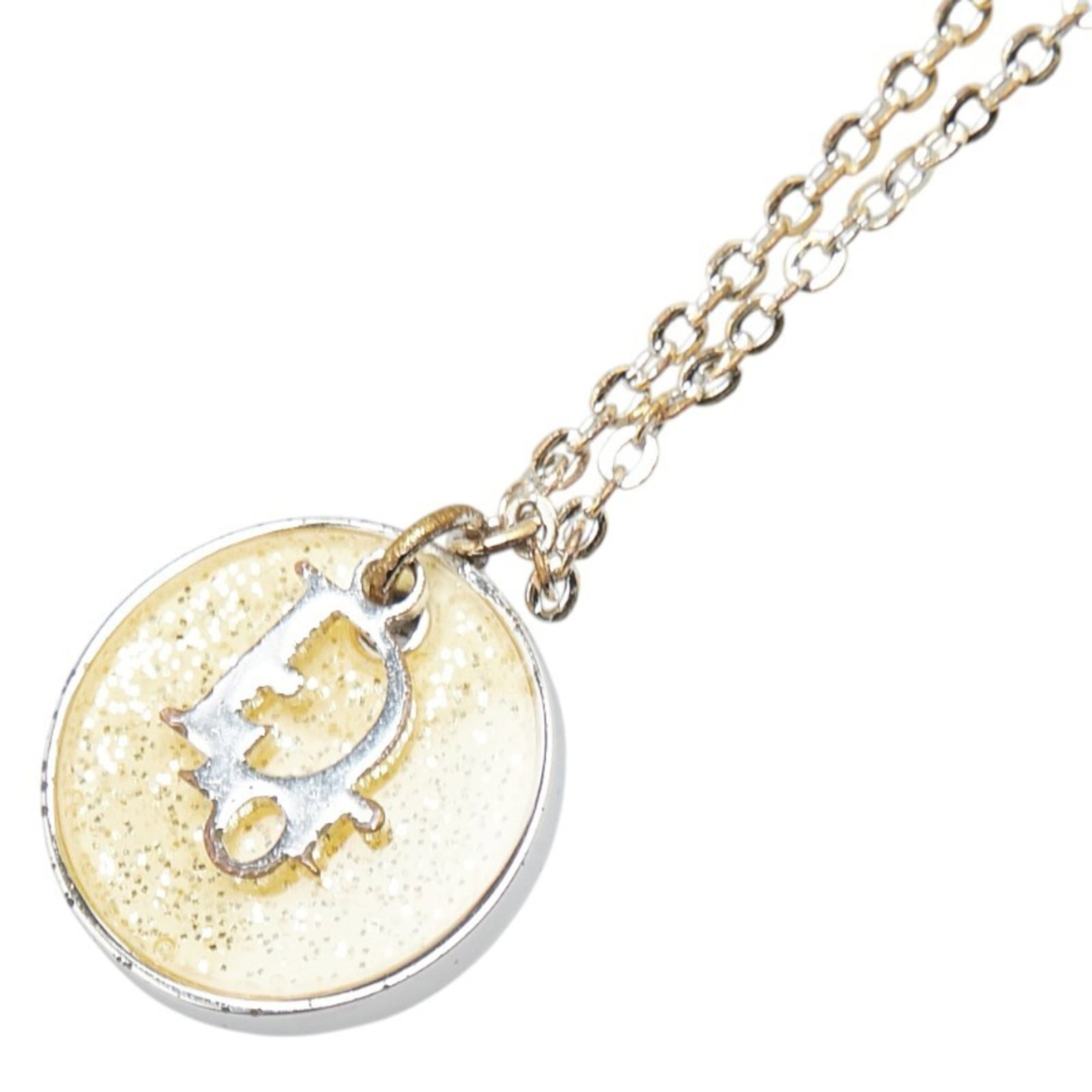 Christian Dior Cd Logo Necklace in Silver and Gold Metal for Women: Christian Dior Cd Logo Necklace in Silver and Gold Metal for Women The Christian Dior Cd Logo Necklace in Silver and Gold Metal is a timeless piece featuring the iconic logo pendant. Made from high-qu