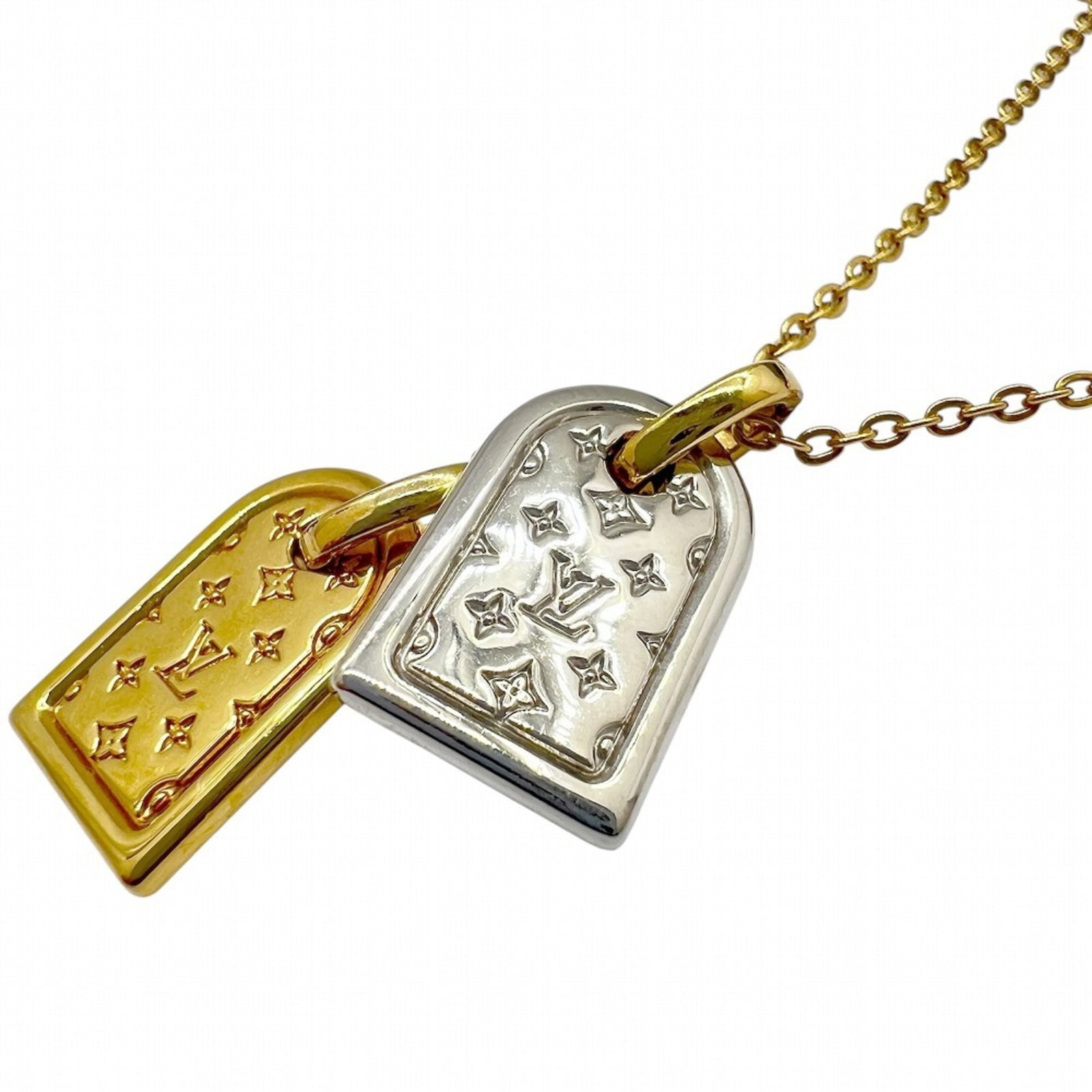 Louis Vuitton Women's Men's M63141 Le1200 Necklace Gold Silver Nanogram: Louis Vuitton Women's Men's M63141 Le1200 Necklace Gold Silver Nanogram Gold Plating, Silver Accents, and Louis Vuitton's Iconic Design - This luxurious necklace boasts gold plating with silver accent