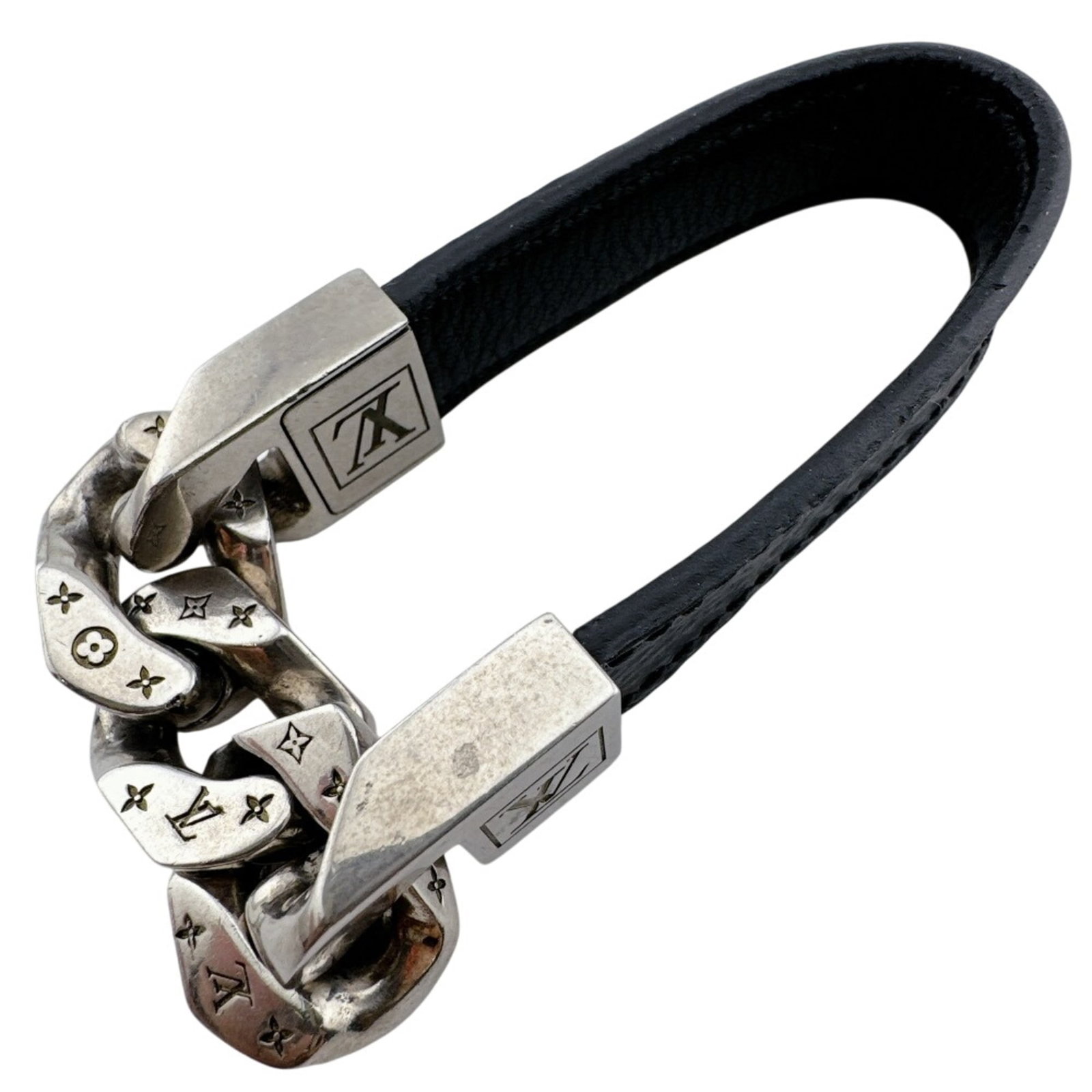 Metal Leather Charm Bracelet By Louis Vuitton: Metal Leather Charm Bracelet By Louis Vuitton Metal Leather Charm Bracelet By Louis Vuitton. This black and silver charm bracelet features high-quality leather and metal construction, with a sleek 17c