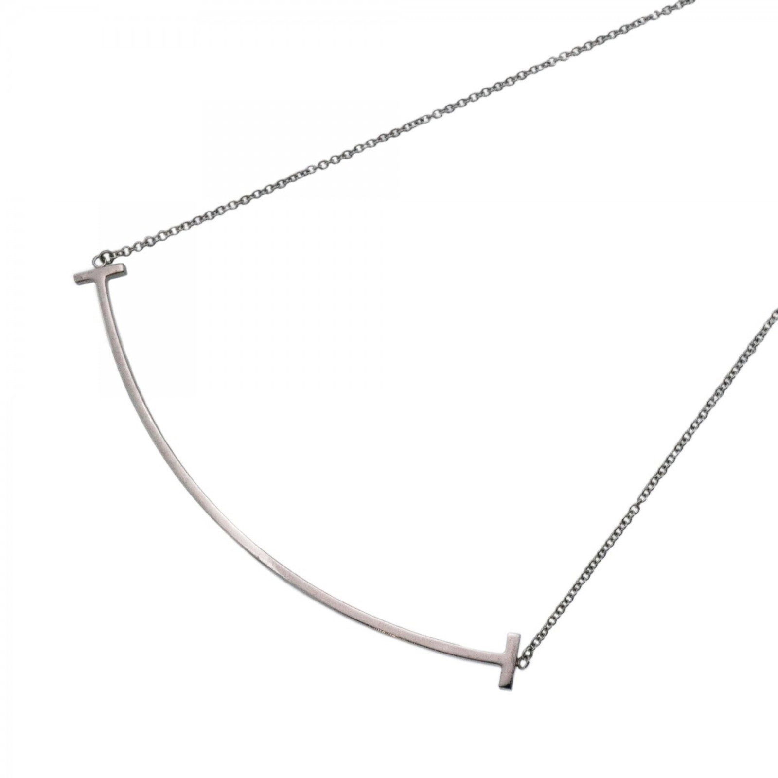 Tiffany & Co. T Smile Large Necklace 18K White Gold Women'S: Tiffany & Co. T Smile Large Necklace 18K White Gold Women'S Tiffany & Co. T Smile Large Necklace in 18K White Gold offers a timeless elegance with its classic design and premium materials. The