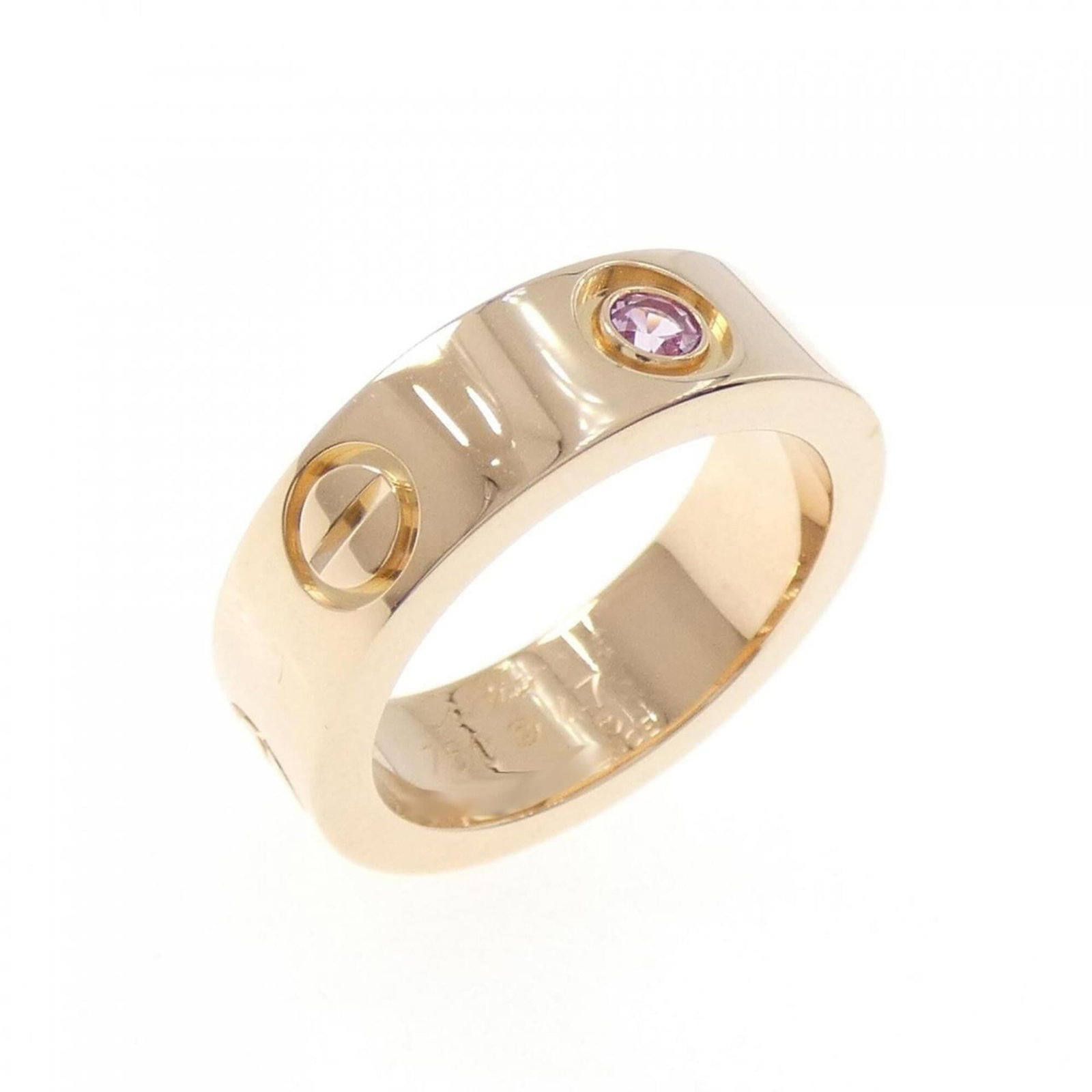 Pink gold 18k ring band from Cartier: Pink gold 18k ring band from Cartier Pink gold 18k ring band from Cartier, featuring a beautiful pink gold material and sapphire stone. This used (like new) item has hardly any traces of usage,