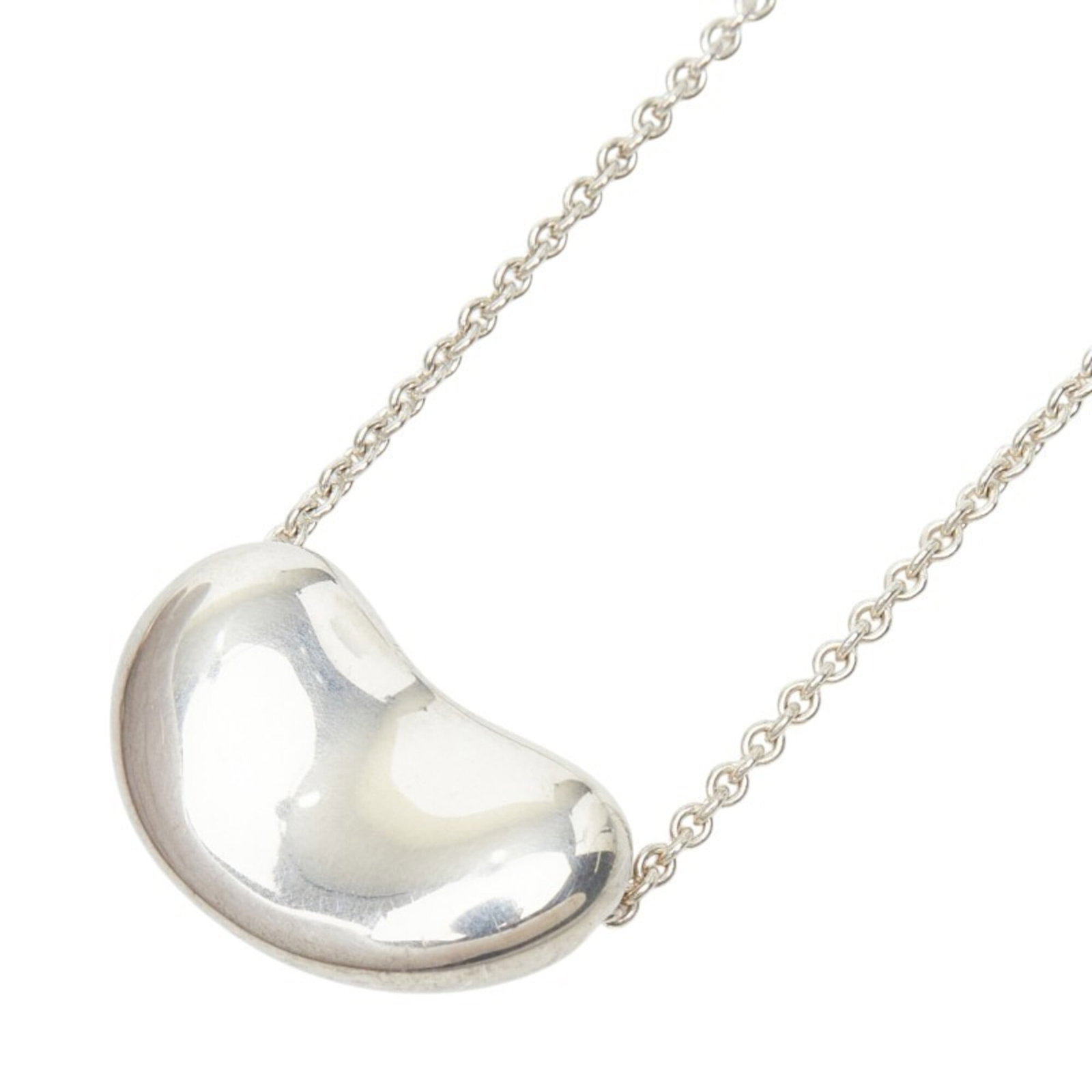 Women's silver Sv925 Bean Necklace Tiffany: Women's silver Sv925 Bean Necklace Tiffany Silver Sv925 Bean Necklace Tiffany features a delicate silver pendant with a subtle shine, measuring 14.2mm x 20.4mm. The necklace itself has a comfortable