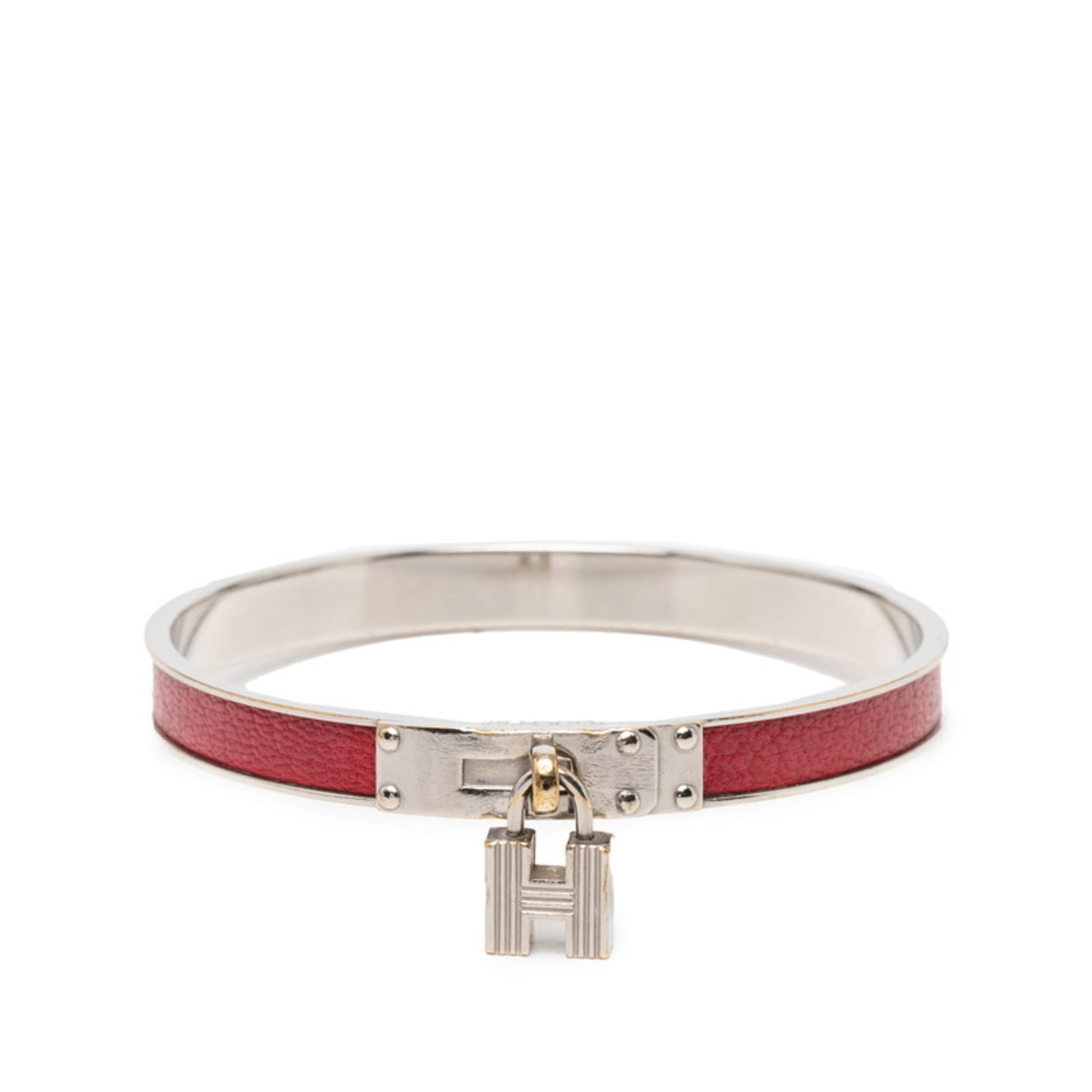 Metal leather bangle Hermes: Metal leather bangle Hermes This metal leather bangle from Hermes features a striking red color and silver accents, adding a touch of elegance to any outfit. With its classic design and durable constr