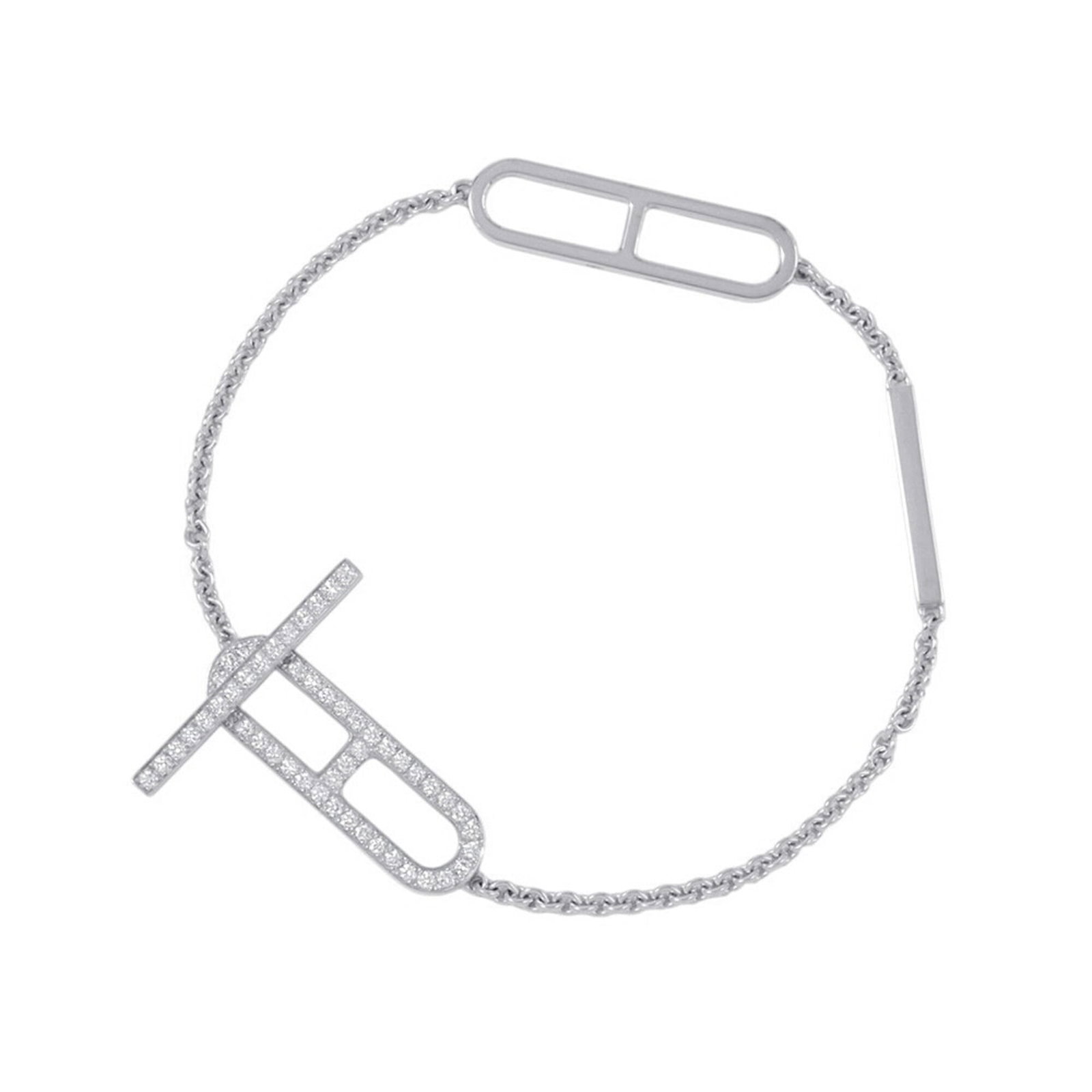 Hermes Charm Bracelet White Gold (18K): Hermes Charm Bracelet White Gold (18K) Used (like new) 18K White Gold Charm Bracelet from Hermes, featuring a diamond stone weighing 0.37 carats and measuring 16cm in length. This beautifully crafted