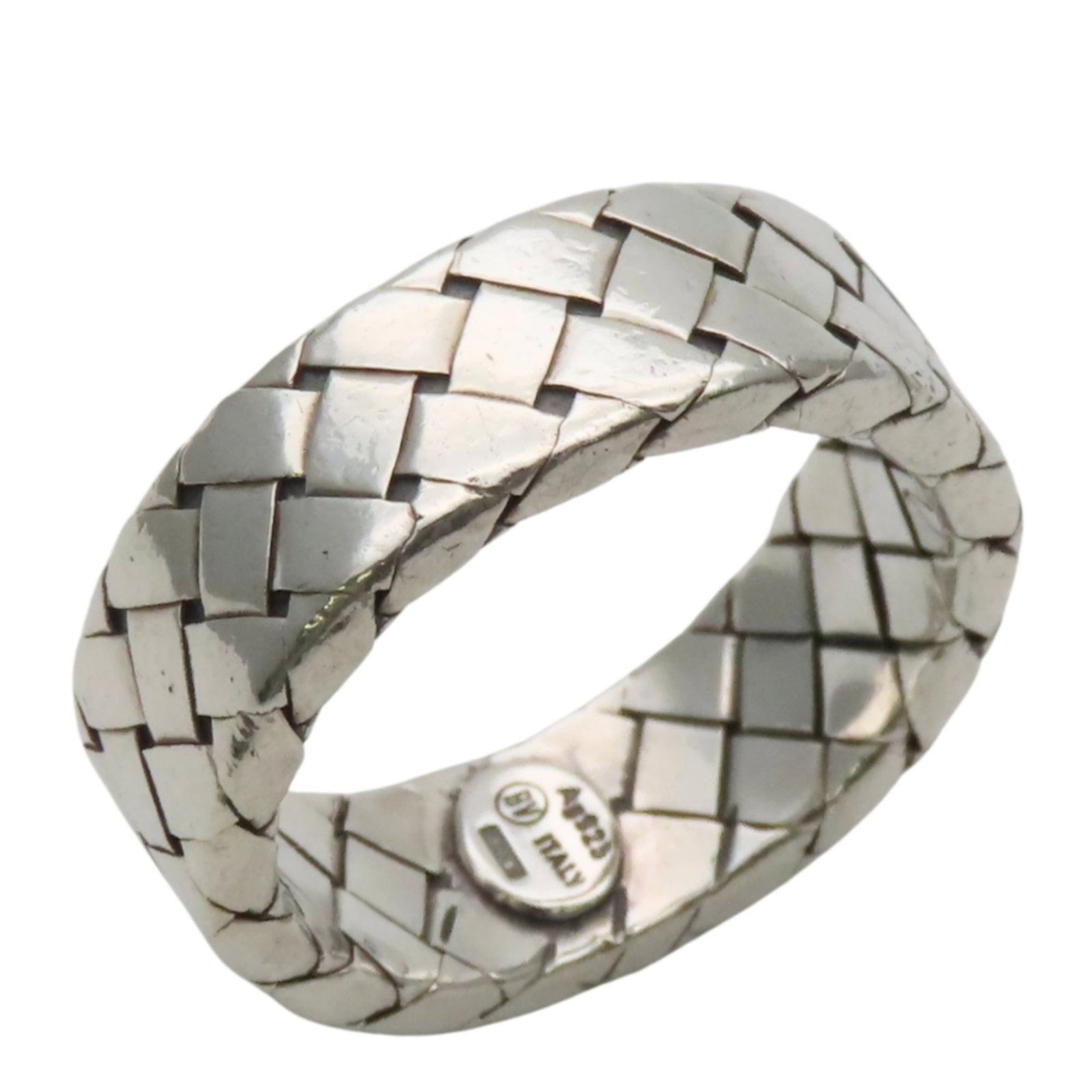 Band ring silver 925 from Bottega Veneta: Band ring silver 925 from Bottega Veneta Silver band ring from Bottega Veneta, made from high-quality silver 925 material. This used item shows signs of wear and tear, with minor scratches and dirt