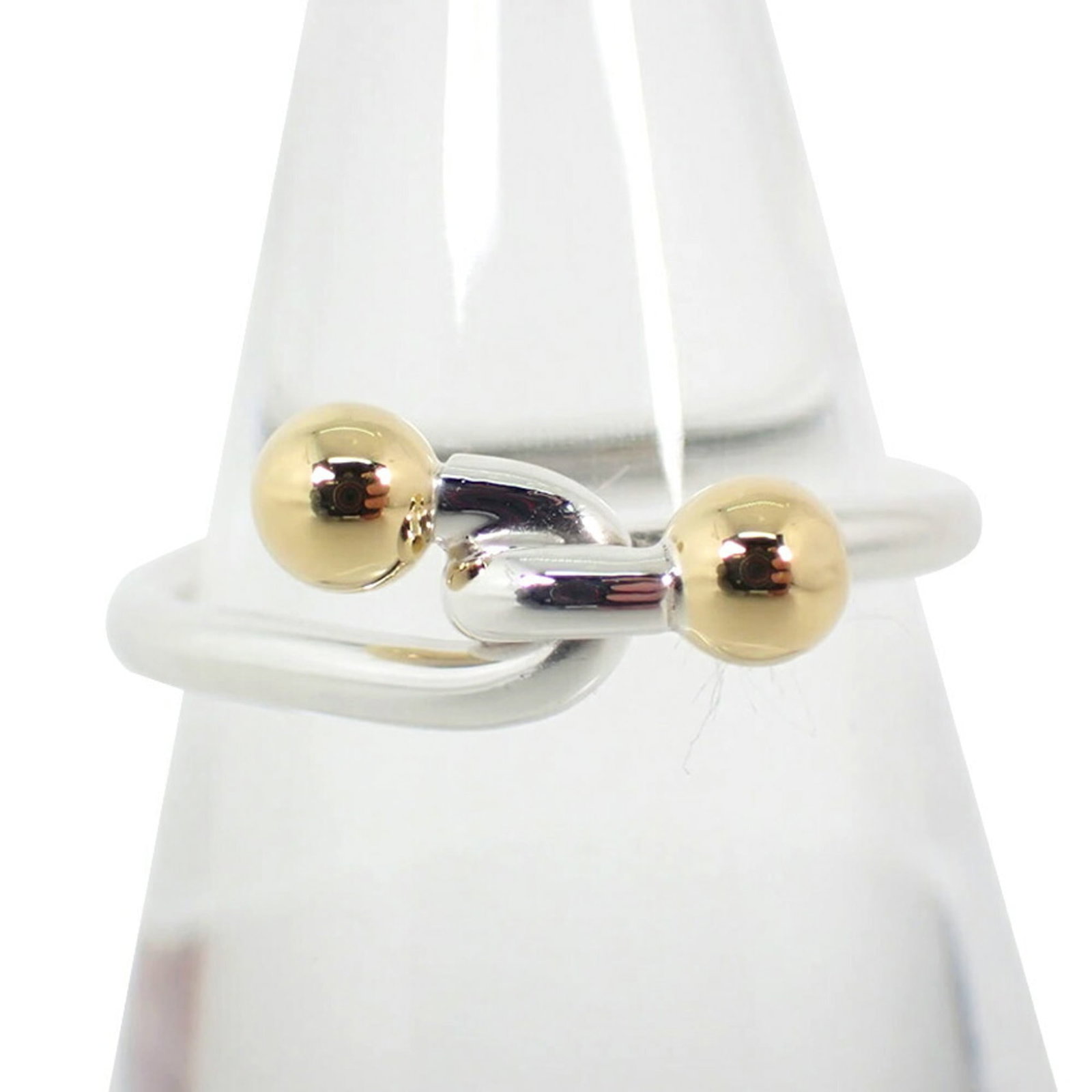 Tiffany Band Ring Sterling Silver 925 Yellow Gold (18K): Tiffany Band Ring Sterling Silver 925 Yellow Gold (18K) Sterling Silver 925 Yellow Gold (18K) band ring from Tiffany, featuring a classic design. This used item is in like new condition with hardly