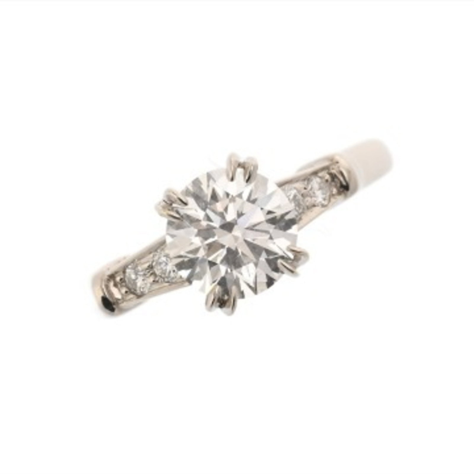 Platinum Ring Band Harry Winston 950: Platinum Ring Band Harry Winston 950 Platinum Ring Band by Harry Winston features a diamond stone set in platinum. The band has some scratches and dirt, but overall remains in very good condition. A