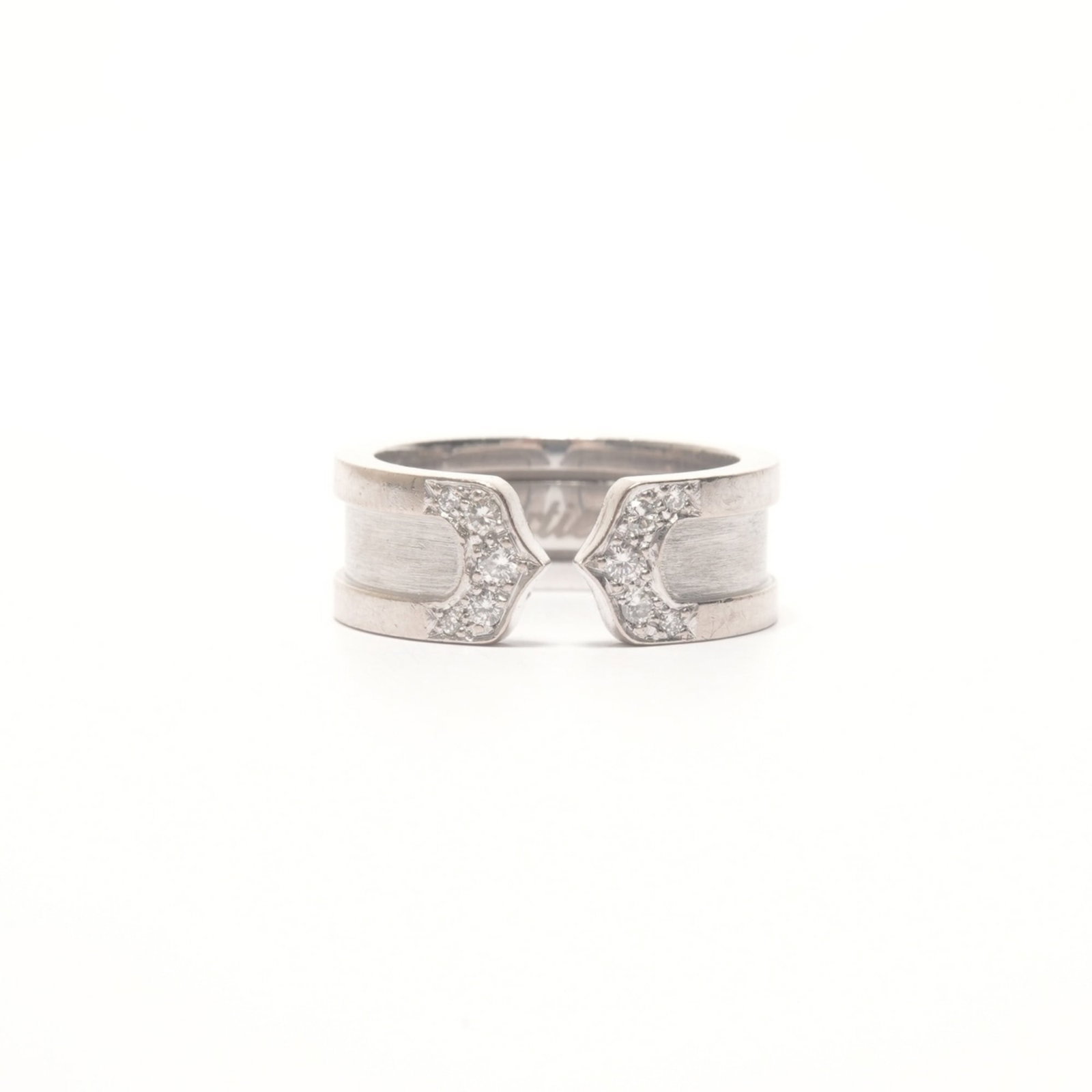 Cartier Band Ring: Cartier Band Ring Silver Cartier Band Ring, featuring the iconic brand design, bears a signature. This used band ring has traces of usage and minor scratches/dirt, but remains in good condition