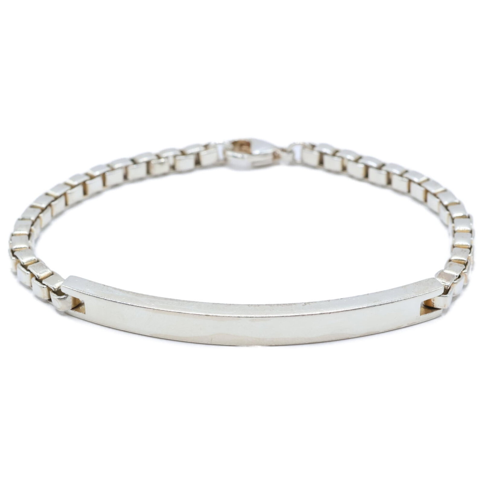 Tiffany Identification Bracelet Silver 925: Tiffany Identification Bracelet Silver 925 Silver 925 Tiffany Identification Bracelet, a delicate and elegant accessory featuring the iconic brand's hallmark. With its slender design and silver tone,