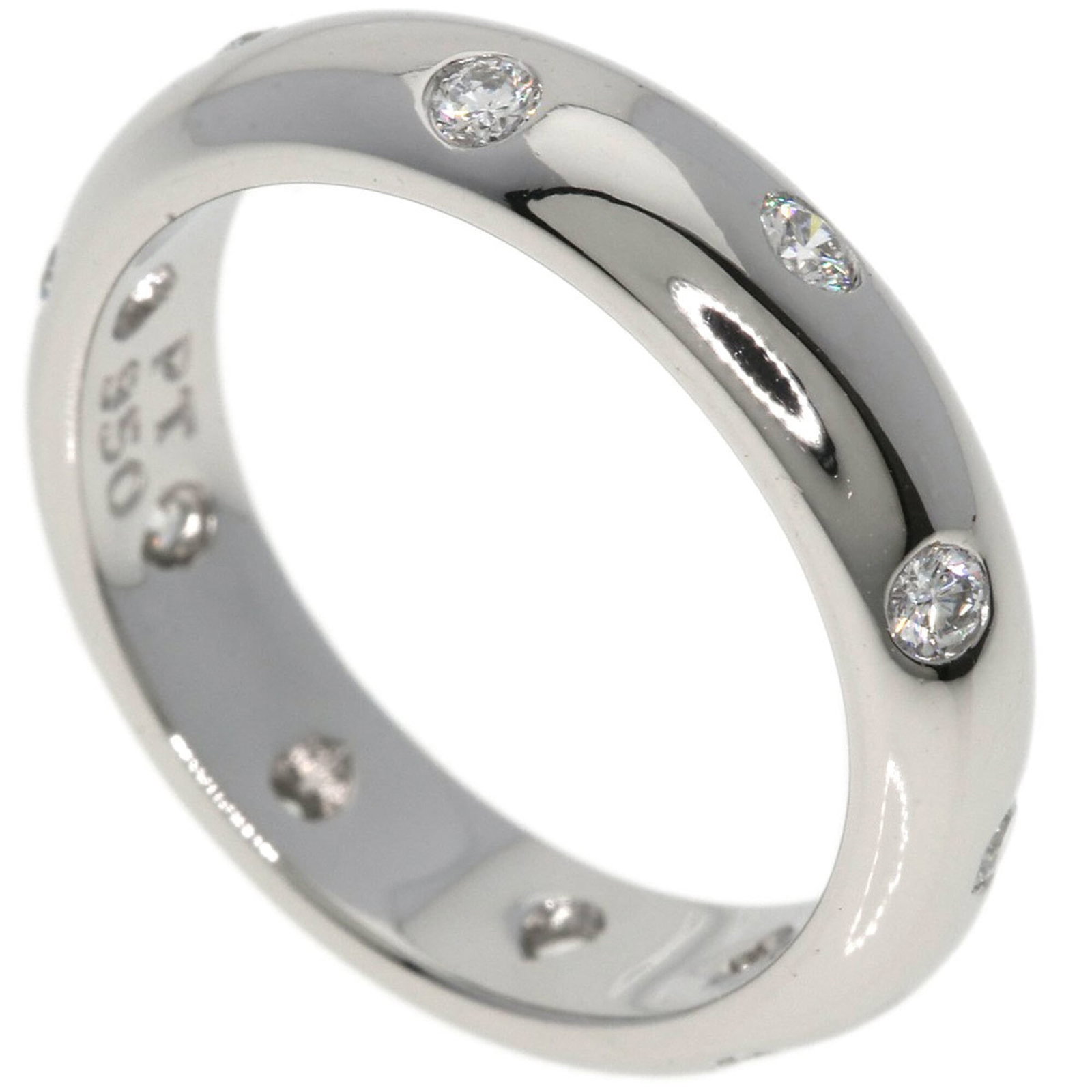 Platinum ring by Tiffany band: Platinum ring by Tiffany band Platinum ring by Tiffany features a band design made from high-quality platinum, with a US size 3.5 to fit comfortably on most women's fingers. The item bears some minor