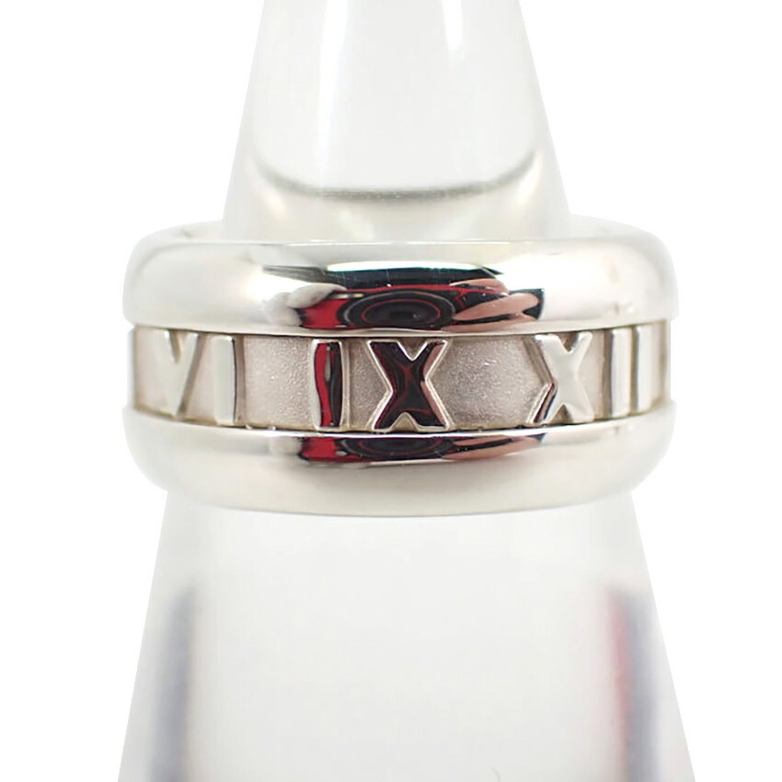 Sterling Silver Ring Tiffany Band: Sterling Silver Ring Tiffany Band Sterling silver ring from Tiffany, featuring a classic band design. The 52mm band size accommodates a US size 6.5 finger, with some minor scratches and dirt visible b