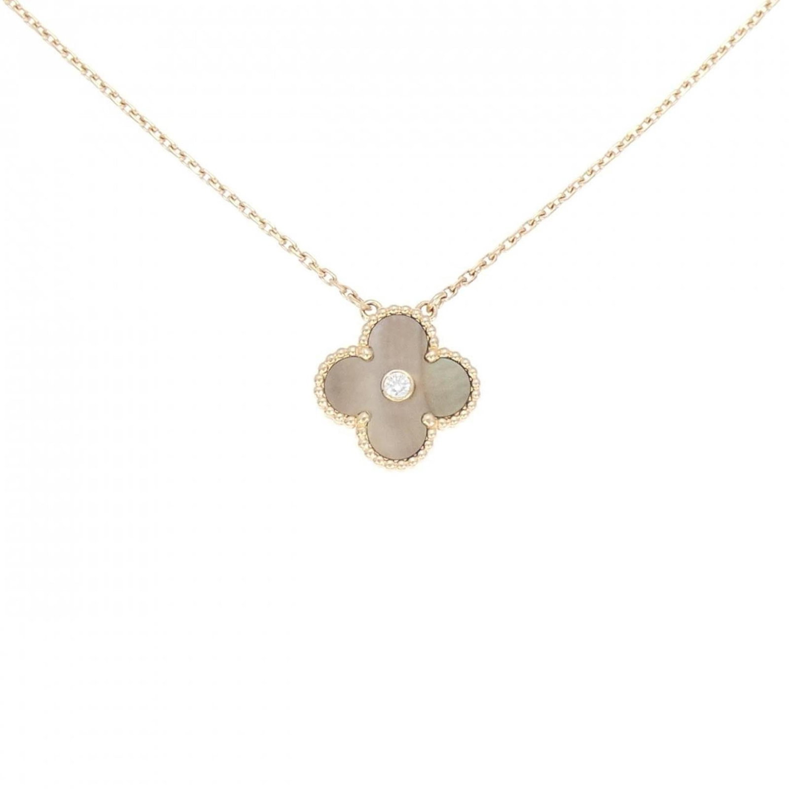Vintage Alhambra Van Cleef Necklace: Vintage Alhambra Van Cleef Necklace Pink gold (18K) pendant adorned with a diamond, set in a classic Alhambra design. This vintage necklace boasts a timeless elegance and sophistication, perfect for