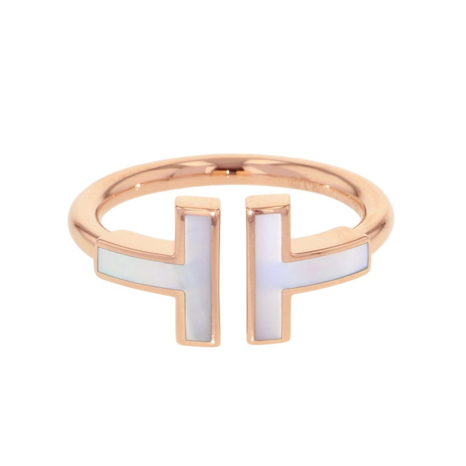 Pink Gold Ring Band Tiffany: Pink Gold Ring Band Tiffany Pink Gold Ring Band from Tiffany, crafted in 18K pink gold with a like-new condition, bearing minor signs of usage. This band showcases the elegant style and