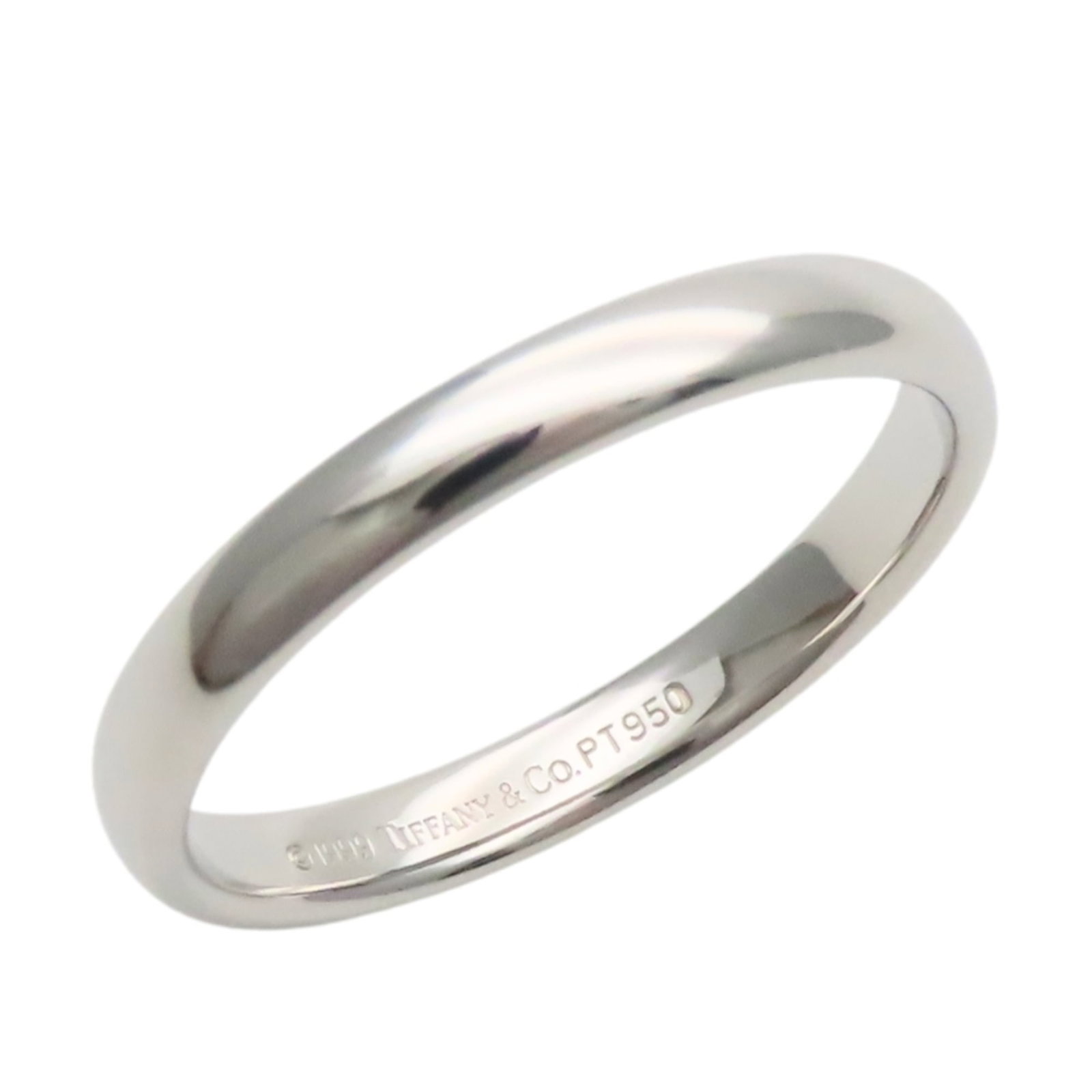 Platinum ring by Tiffany band: Platinum ring by Tiffany band Platinum ring by Tiffany features a high-quality band made from 950 platinum, offering a sleek and modern design. In excellent condition, it bears a signature, a notable