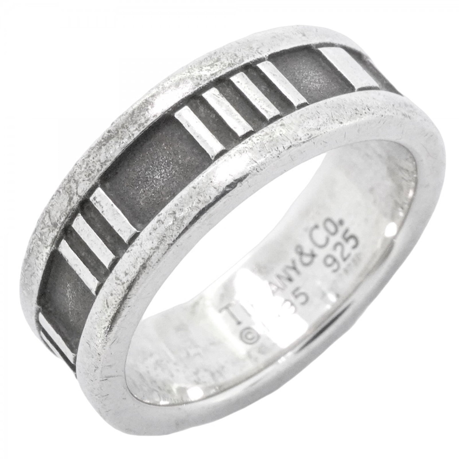 Tiffany Band Ring Silver 925: Tiffany Band Ring Silver 925 Silver 925 band ring from Tiffany, featuring a classic design with subtle wear and minor scratches. The item bears the brand's mark and is made from high-quality silver al