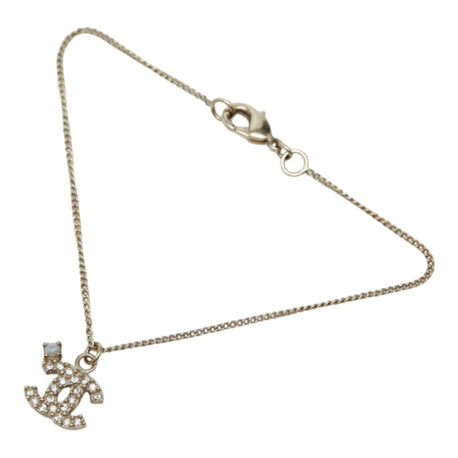 Chanel Charm Bracelet Gold Plating: Chanel Charm Bracelet Gold Plating Chanel Charm Bracelet Gold Plating - A stylish and elegant accessory featuring gold plating, artificial pearl, and rhinestone accents. This 18.5cm charm bracelet sho