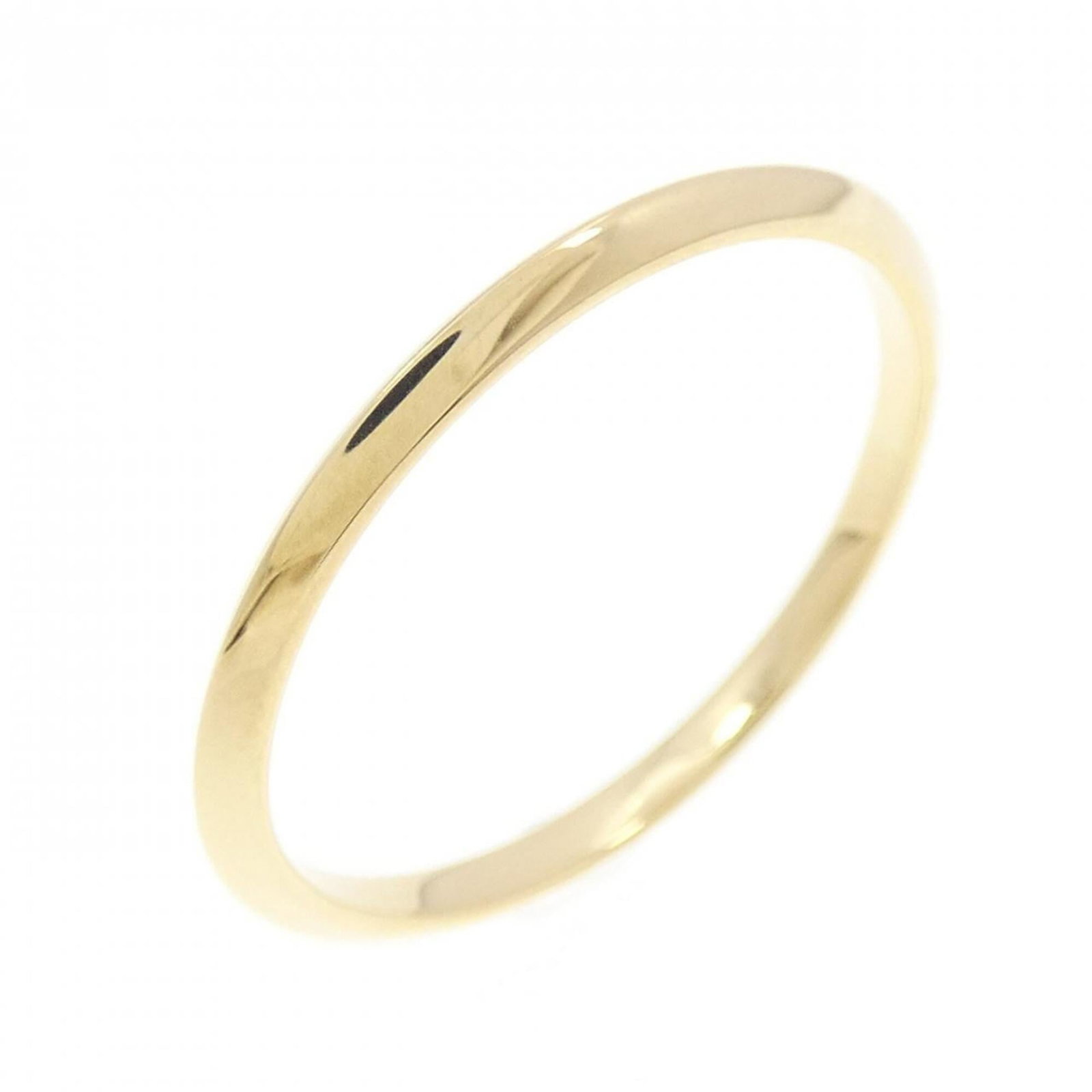 Tiffany Ring Gold Yellow 18K: Tiffany Ring Gold Yellow 18K 18K Yellow Gold Tiffany Band Ring in Excellent Condition. This beautiful band ring features the iconic Tiffany brand and is made from high-quality yellow gold, a few trace
