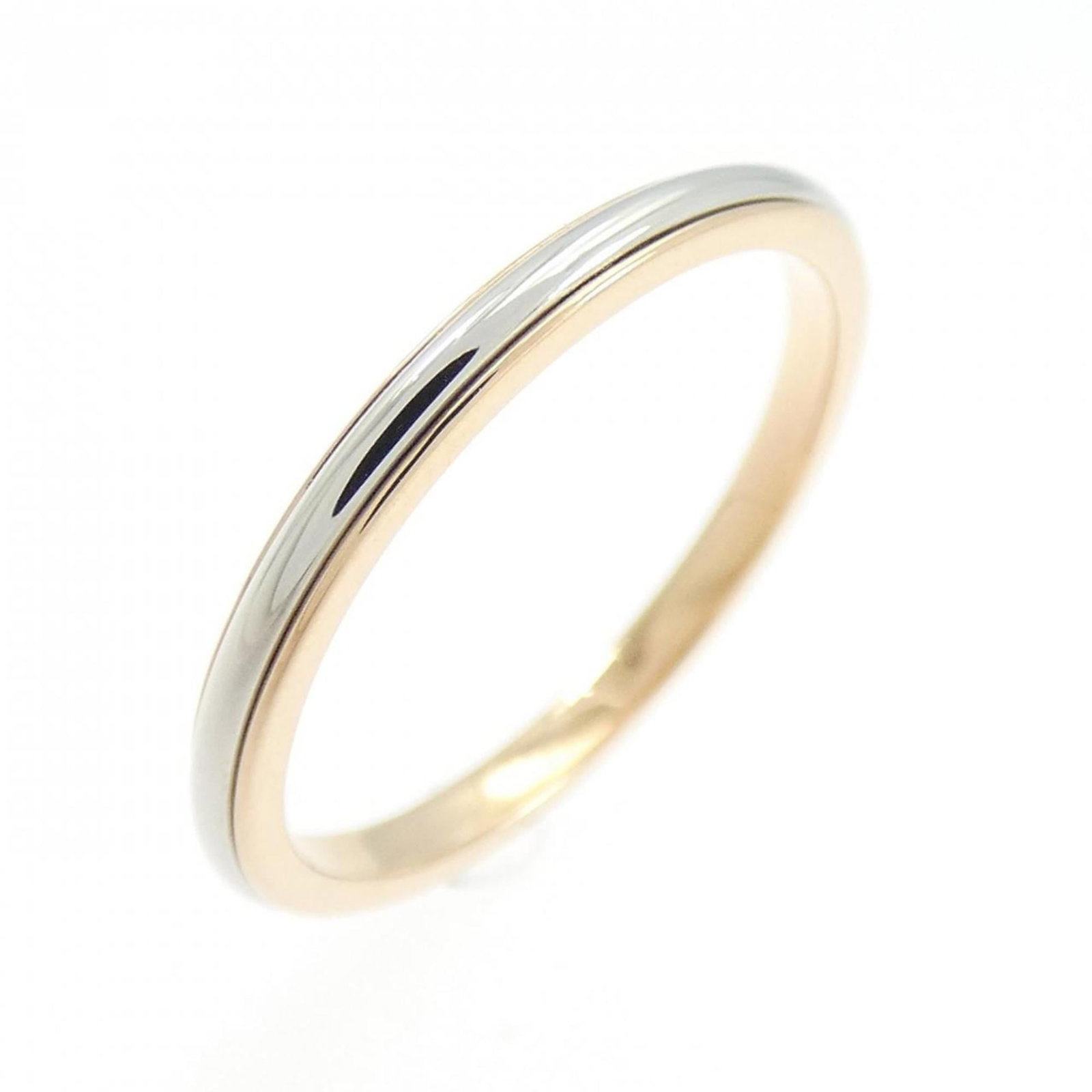 Pink Gold Platinum Ring 950 18K Tiffany Band: Pink Gold Platinum Ring 950 18K Tiffany Band 18K pink gold and platinum band ring from Tiffany, featuring a beautiful combination of these precious metals. The ring bears some traces of usage, with mi