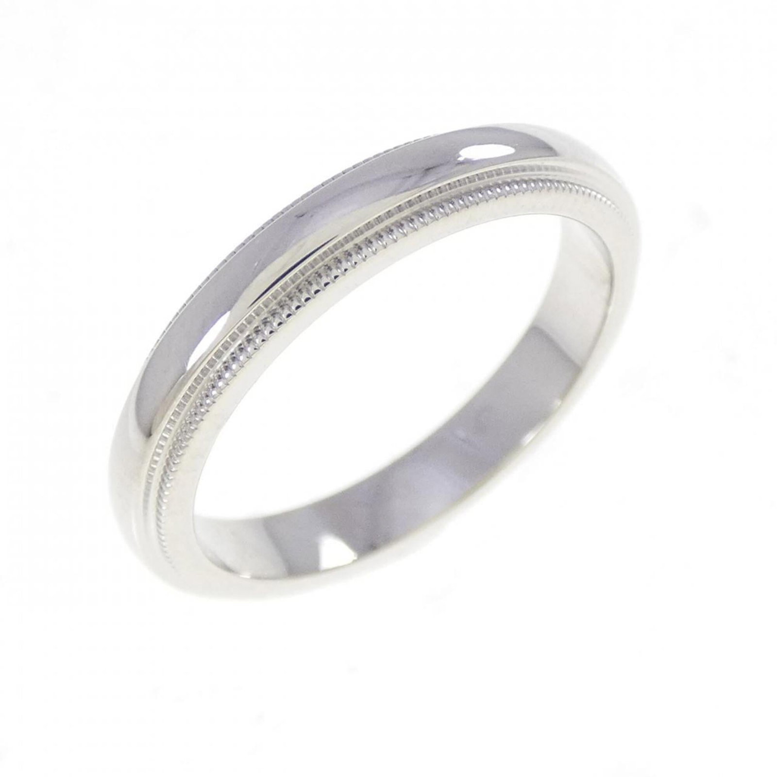 Platinum ring by Tiffany band: Platinum ring by Tiffany band Platinum ring by Tiffany & Co. features a sleek band design with a width of 3mm, making it a stylish addition to any outfit. This pre-owned piece boasts a durable