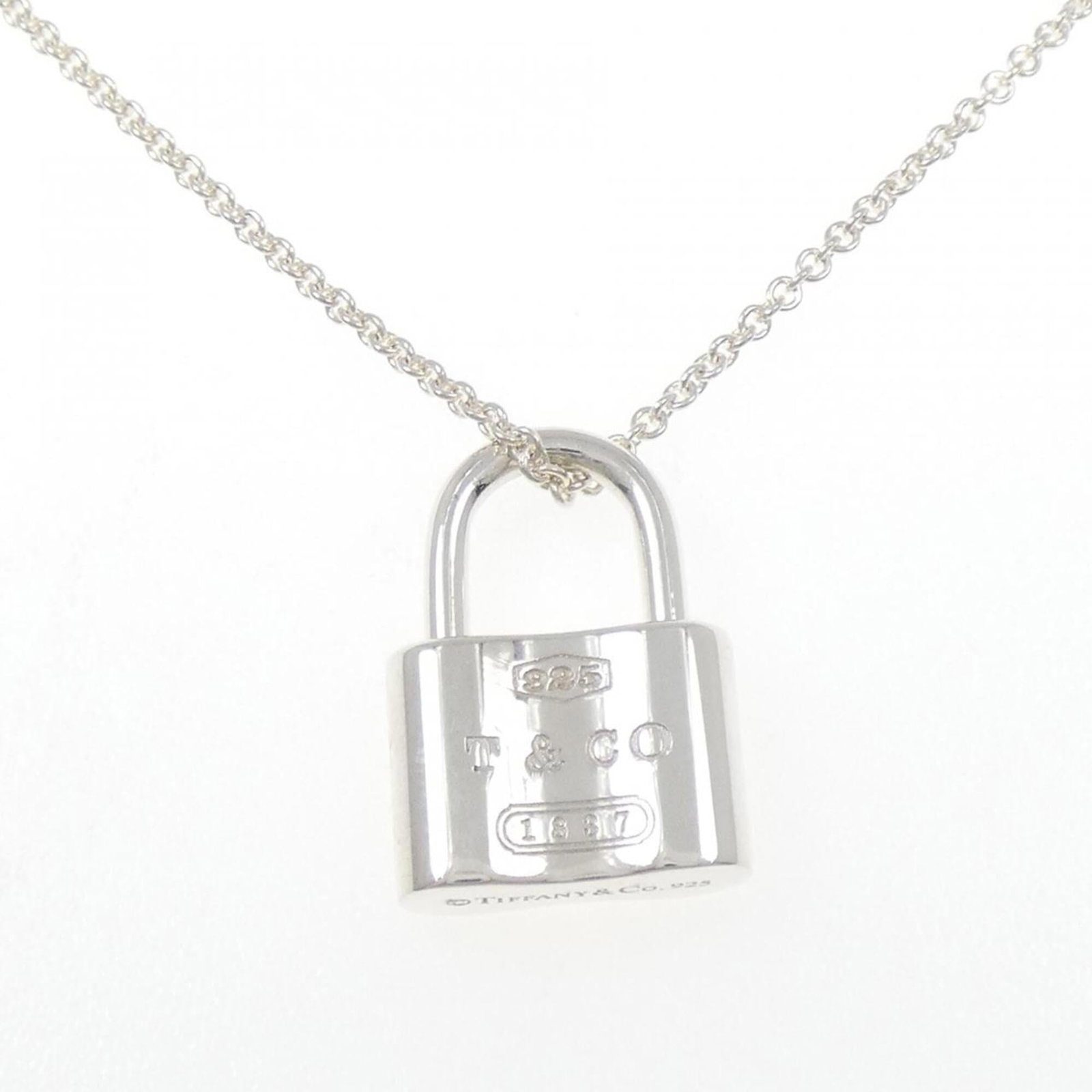 Tiffany & Co. 1837 Rock Necklace: Tiffany & Co. 1837 Rock Necklace Tiffany & Co. 1837 Rock Necklace features a sterling silver pendant with a 19.9mm x 14.3mm design, set against a chain with a 42 cm circumference. The necklace bears a