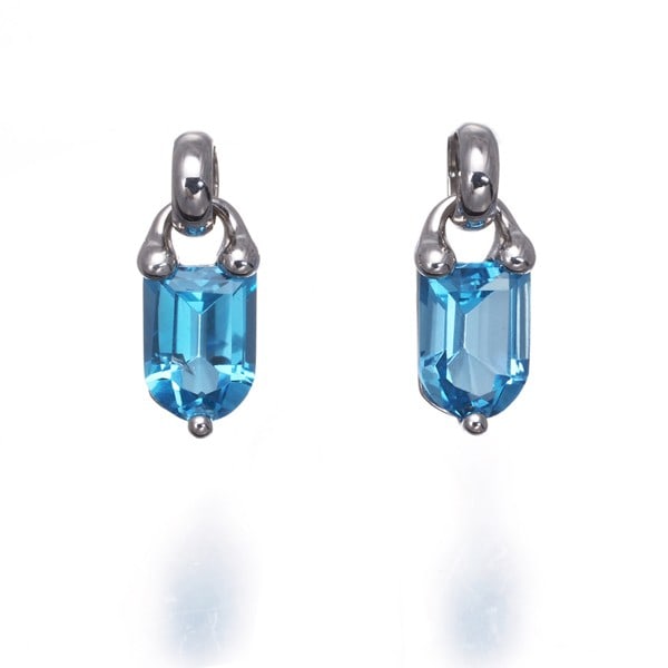 Topaz Solitaire Earrings 14K 585 White Gold: Topaz Solitaire Earrings 14K 585 White Gold Topaz solitaire earrings in 14k white gold showcase the natural beauty of topaz, set in a simple yet elegant stud design. The high-quality white gold metal