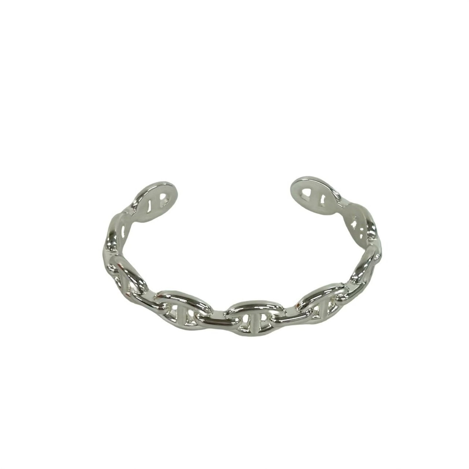 Hermes Bangle Silver 925: Hermes Bangle Silver 925 Silver 925 bangle from Hermes, with a length of 16.5cm and a subtle sheen to the metal. The bangle bears traces of usage, including minor scratches and dirt, but remains in