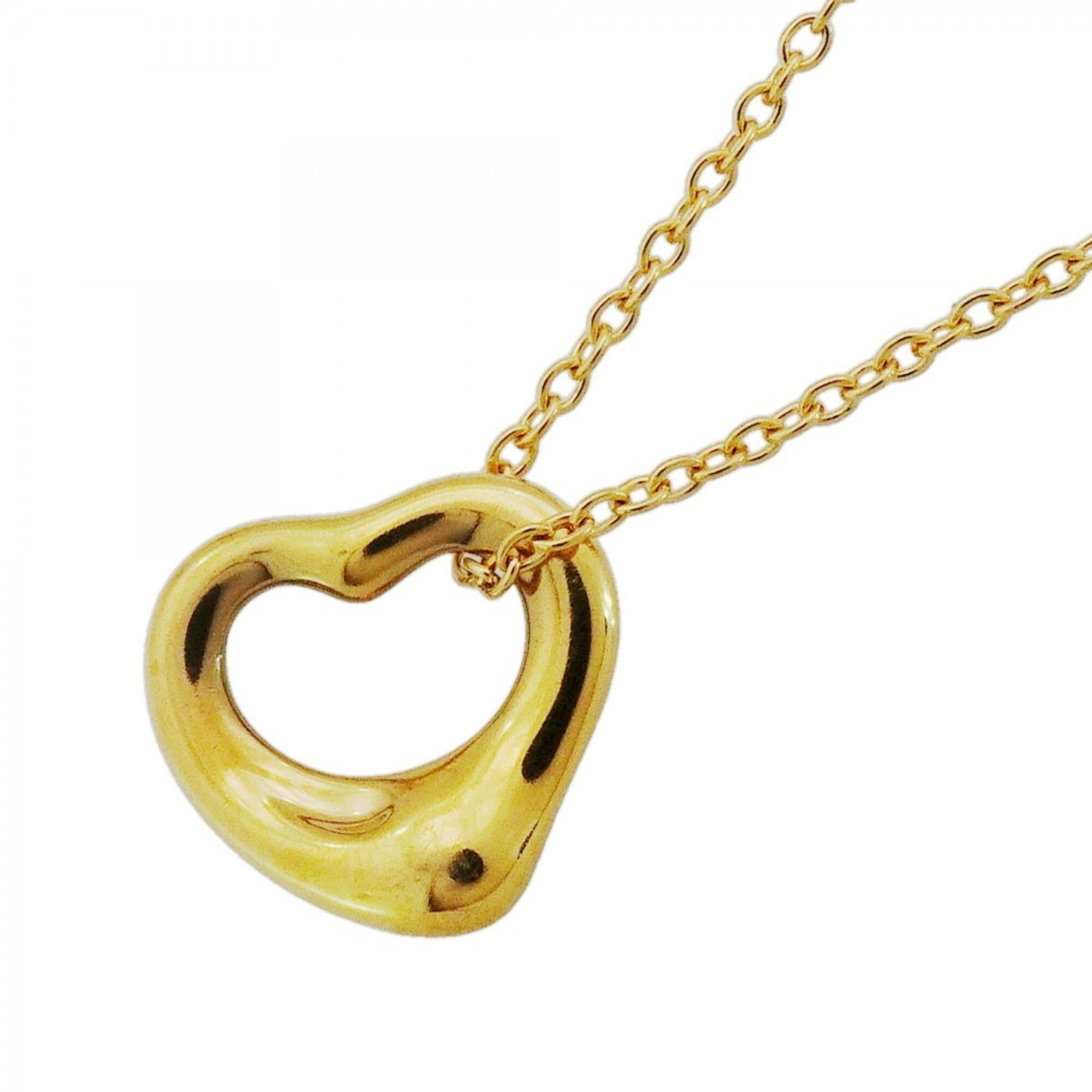 Tiffany Co Heart Necklace 18k Yellow Gold Women: Tiffany Co Heart Necklace 18k Yellow Gold Women 18k Yellow Gold Tiffany Co Heart Necklace for Women. This elegant necklace features a 10mm x 11.1mm heart pendant suspended from an 18k yellow gold chai
