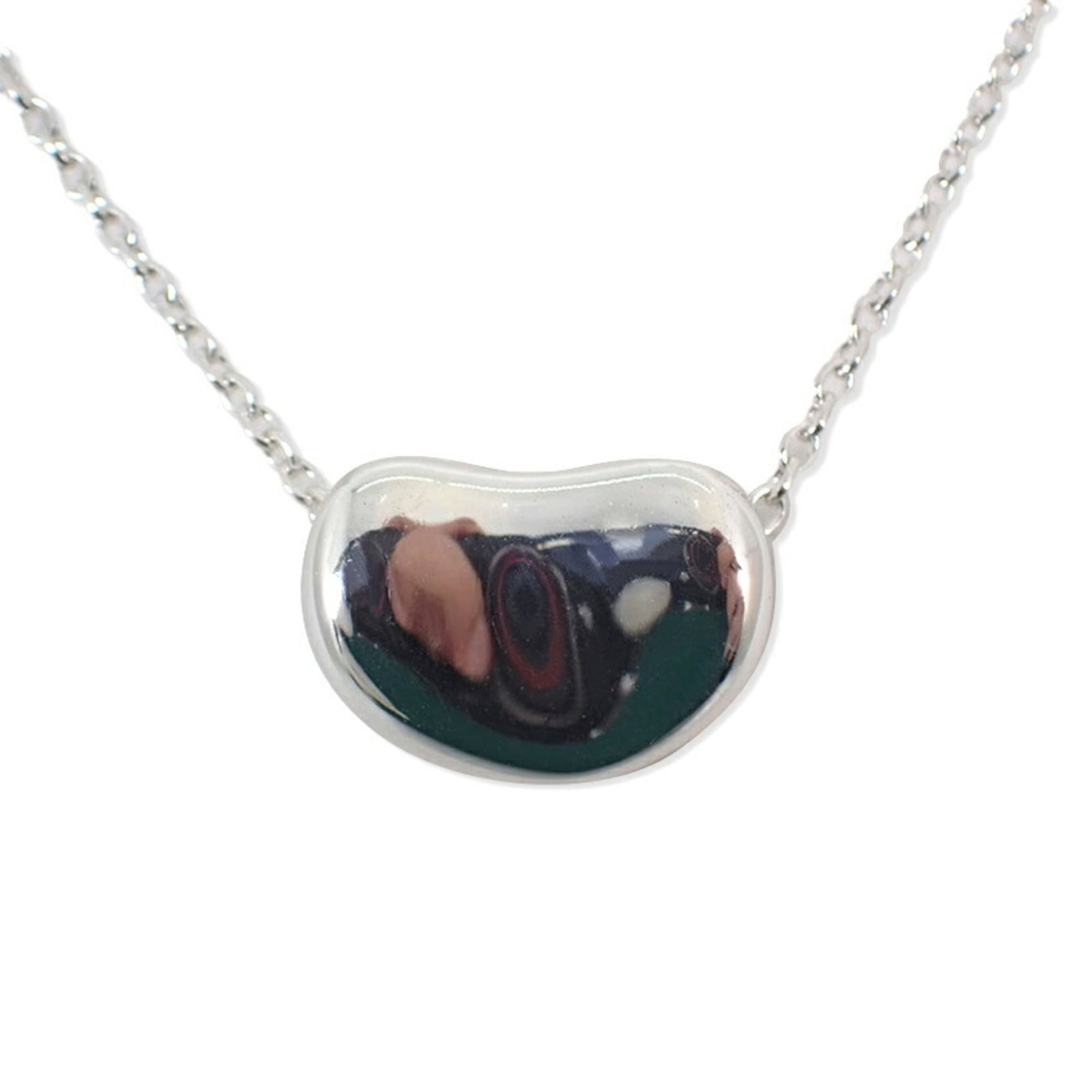 Tiffany 925 Bean Pendant Necklace: Tiffany 925 Bean Pendant Necklace Sterling silver 925, the Tiffany Bean Pendant Necklace boasts elegant simplicity with its understated design. The necklace features a 7.3mm x 10.4mm pendant made from