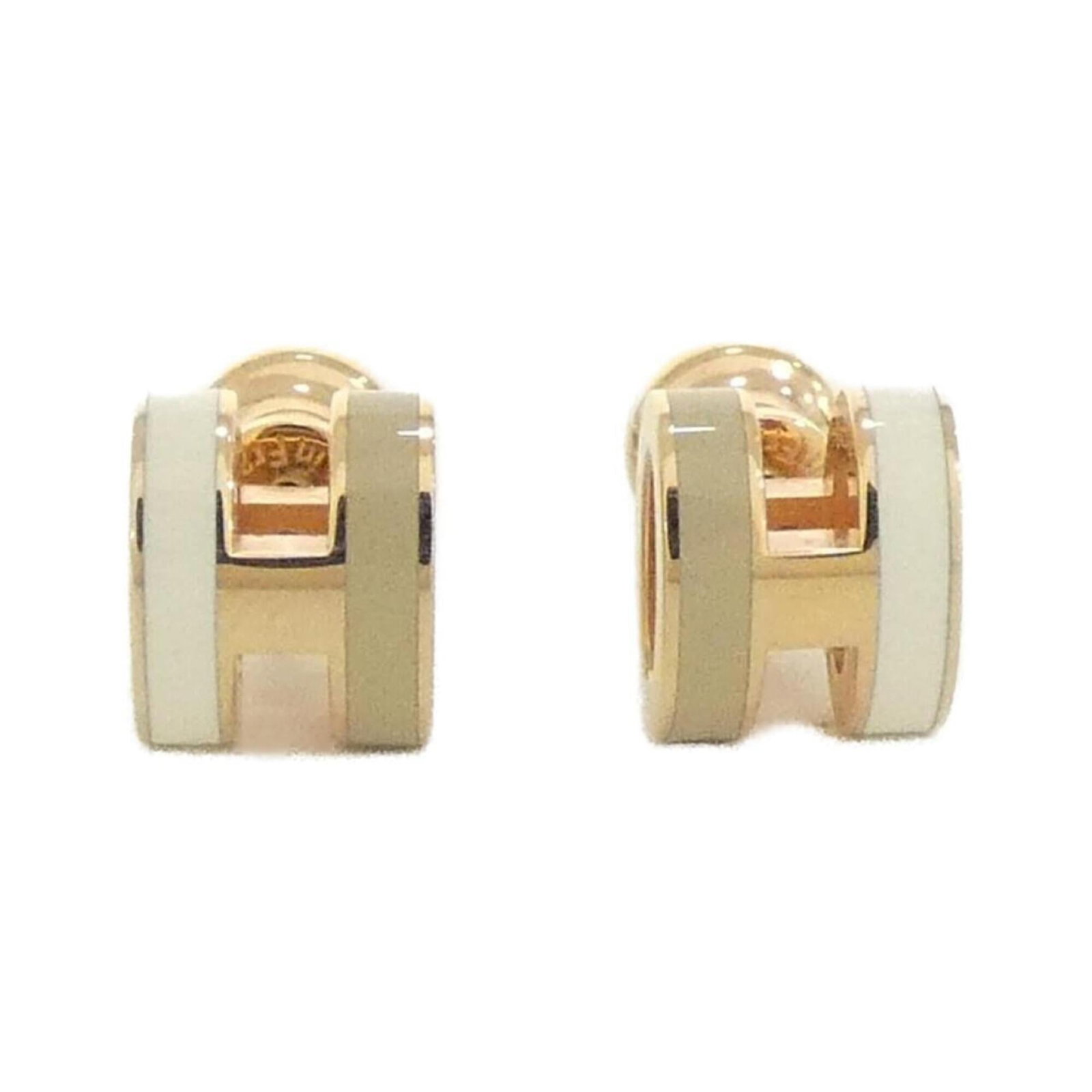 Pop H Rocabar Hermes Mini 100065Fo Earrings: Pop H Rocabar Hermes Mini 100065Fo Earrings Palladium earrings with a subtle beige hue, measuring 0.80mm x 0.70mm in size, bear the signature of Hermes on each earring, showcasing a touch of luxury an