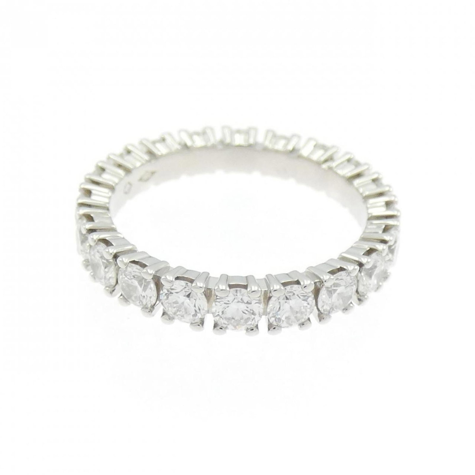 Ring Band by Platinum 950: Ring Band by Platinum 950 Made from high-quality Platinum 950, this Cartier Ring Band offers a touch of luxury. With its sleek design and subtle details, it's a stylish accessory for everyday wear. In