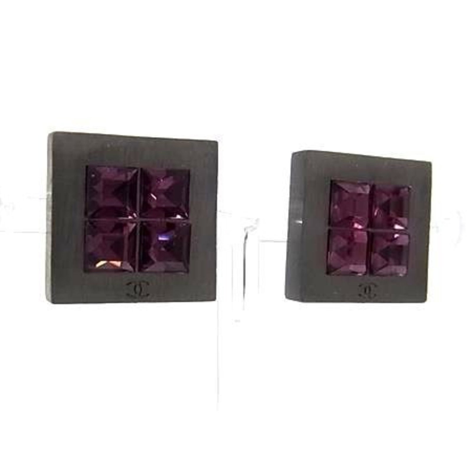 Clip earrings metal by Chanel: Clip earrings metal by Chanel Black metal clip earrings by Chanel, featuring a sleek and minimalist design. The small size (1.70mm x 1.70mm) makes them perfect for everyday wear. With traces of usage